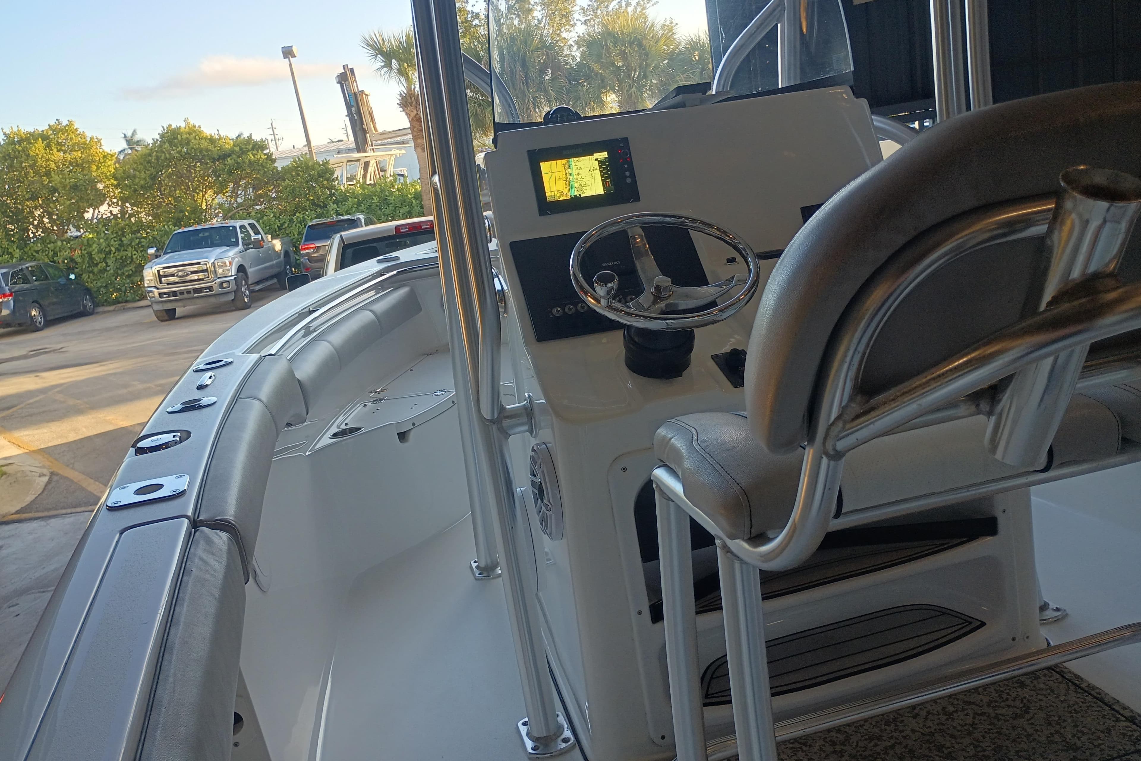 2017 Seapro 219 boat interior with steering wheel and navigation display.