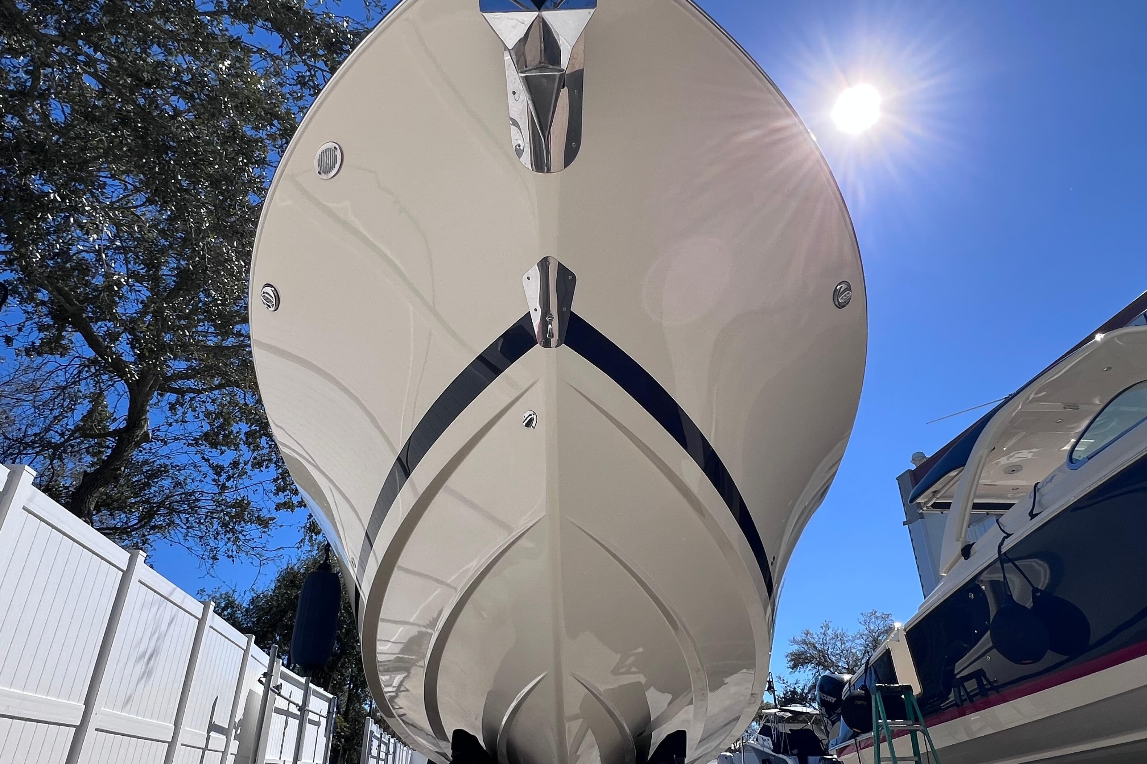 2022 Chris-Craft Catalina 30 boat under bright sun, viewed from below.
