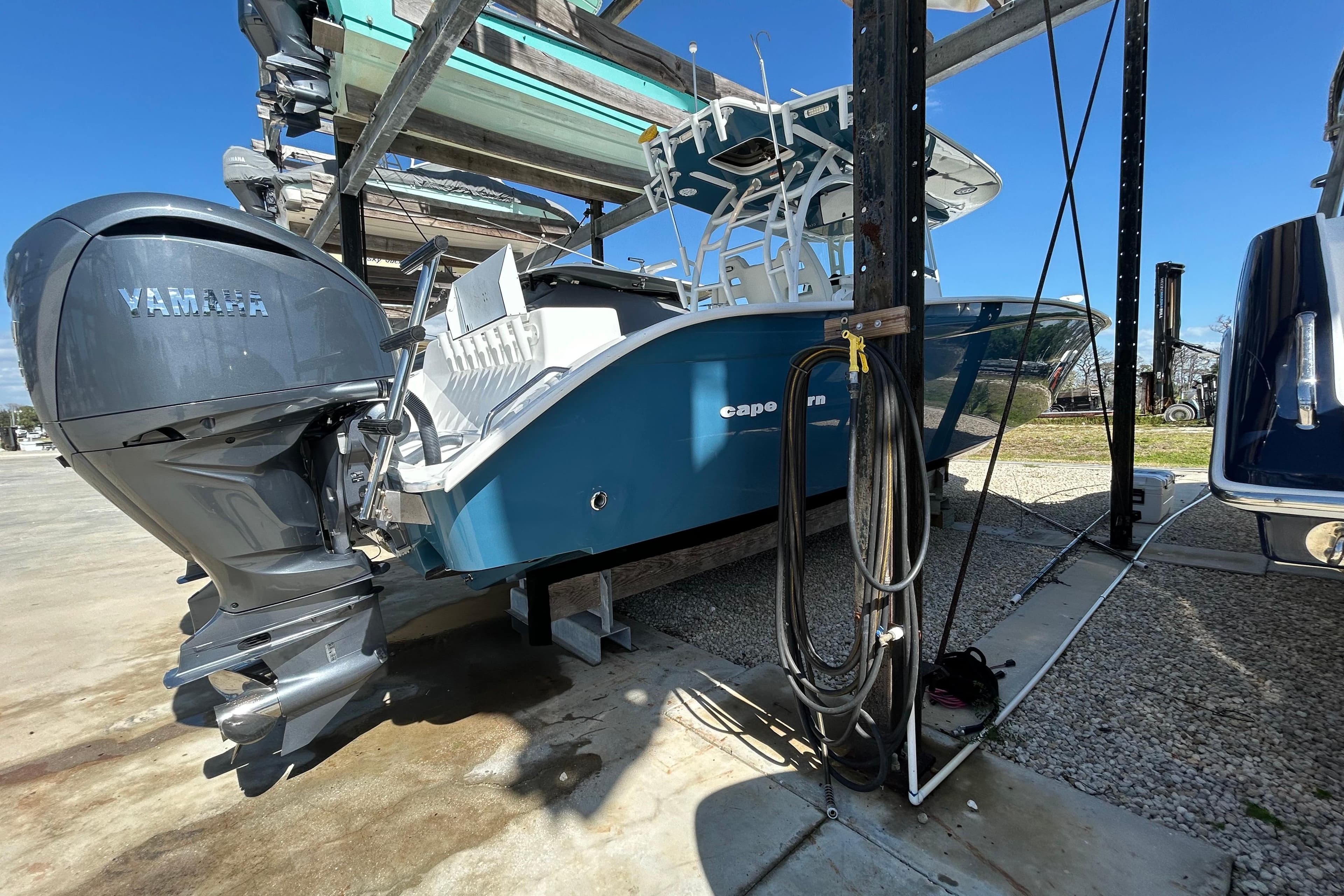 2022 Cape Horn 36 boat with Yamaha engine in storage facility.
