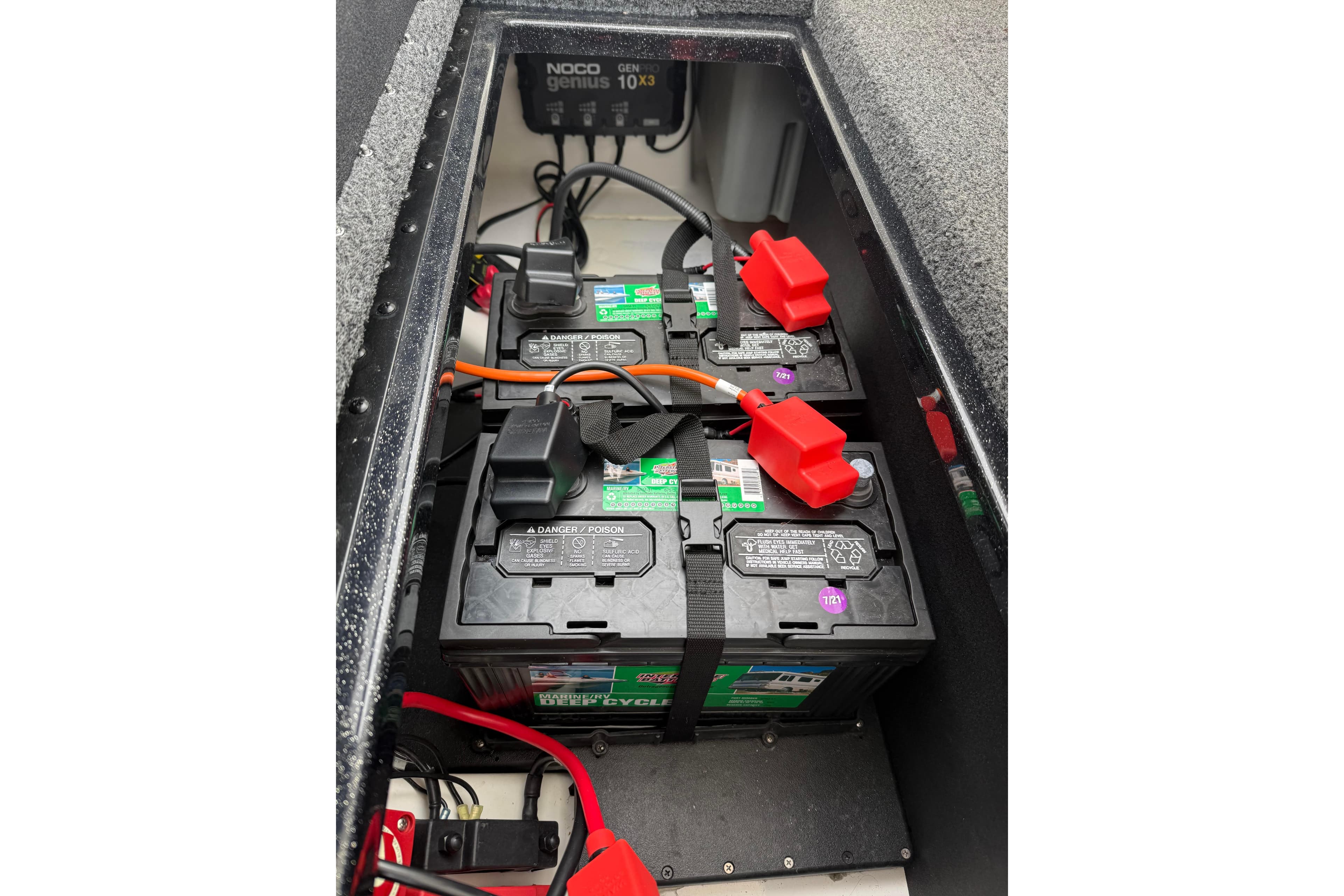 Battery compartment of 2022 Nitro Z18 boat with NOCO Genius charger.