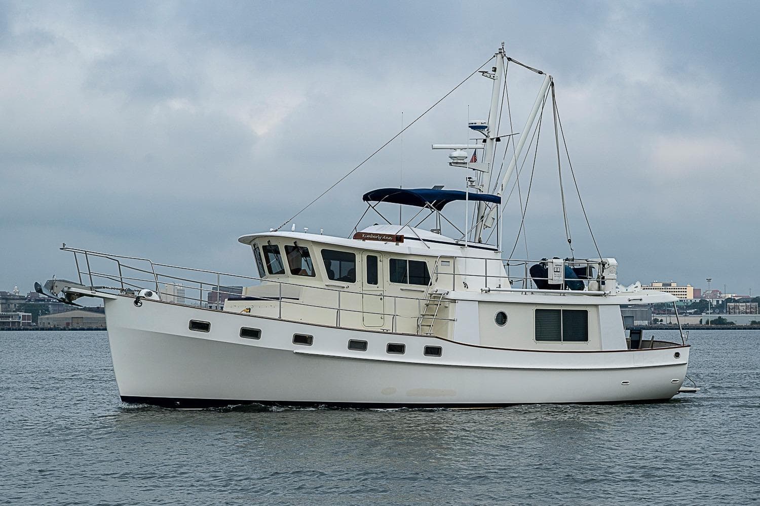2008 Kadey-Krogen 48 North Sea yacht on calm waters under cloudy skies.
