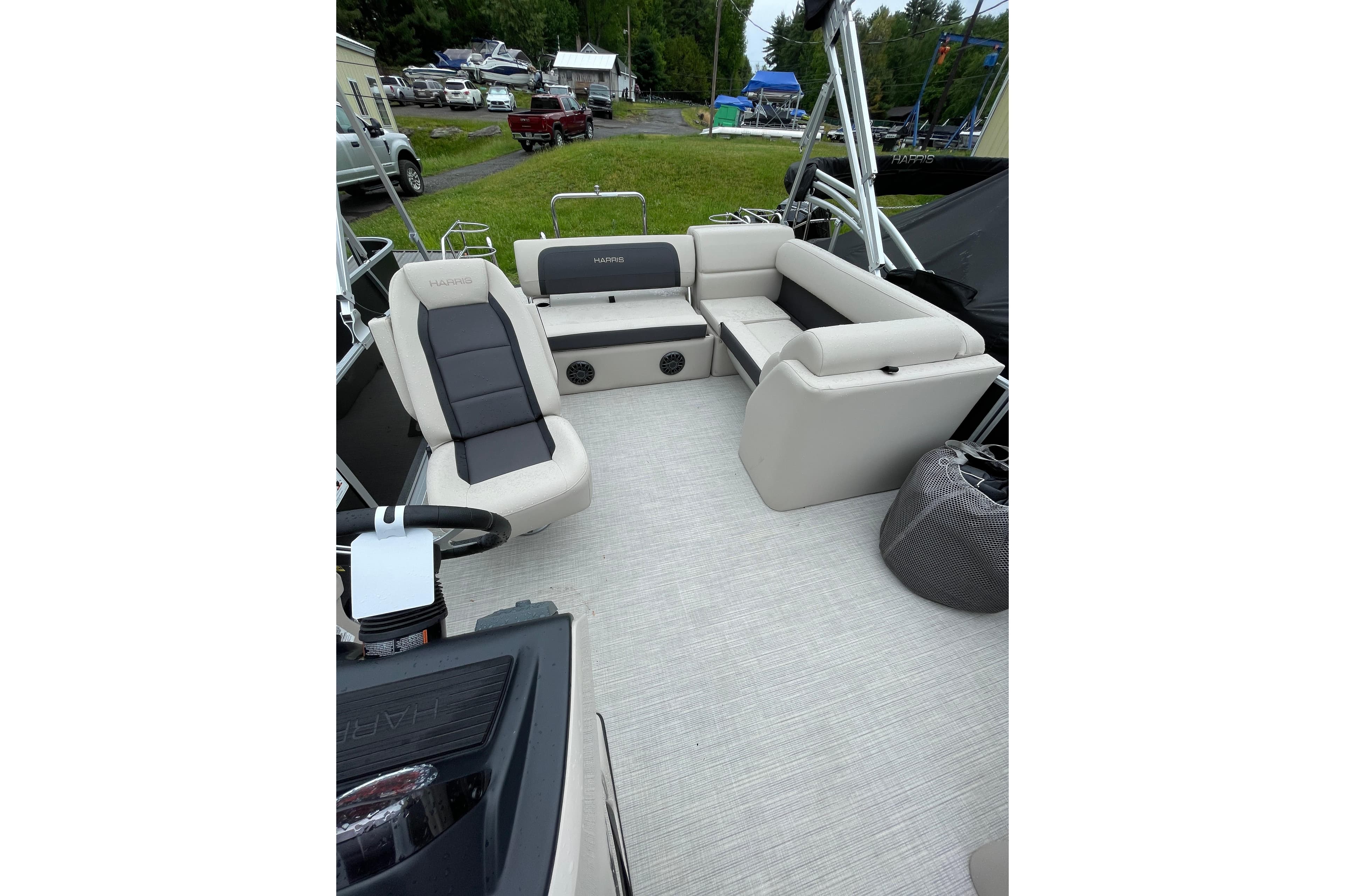 2026 Harris Cruiser 230 SL pontoon boat interior with plush seating and modern design.