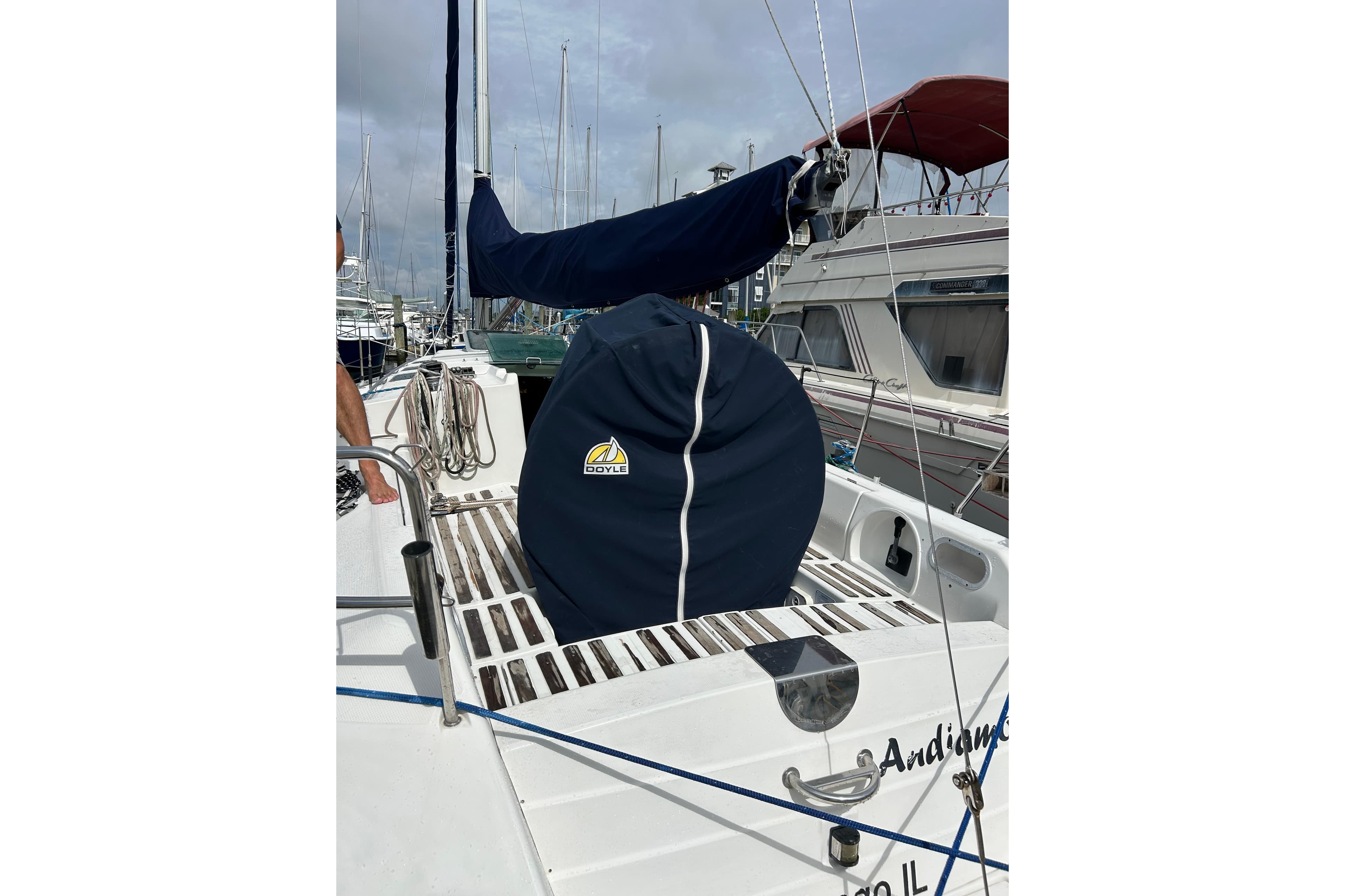 1992 Beneteau First 35s5 sailboat deck with Doyle sail cover in marina.
