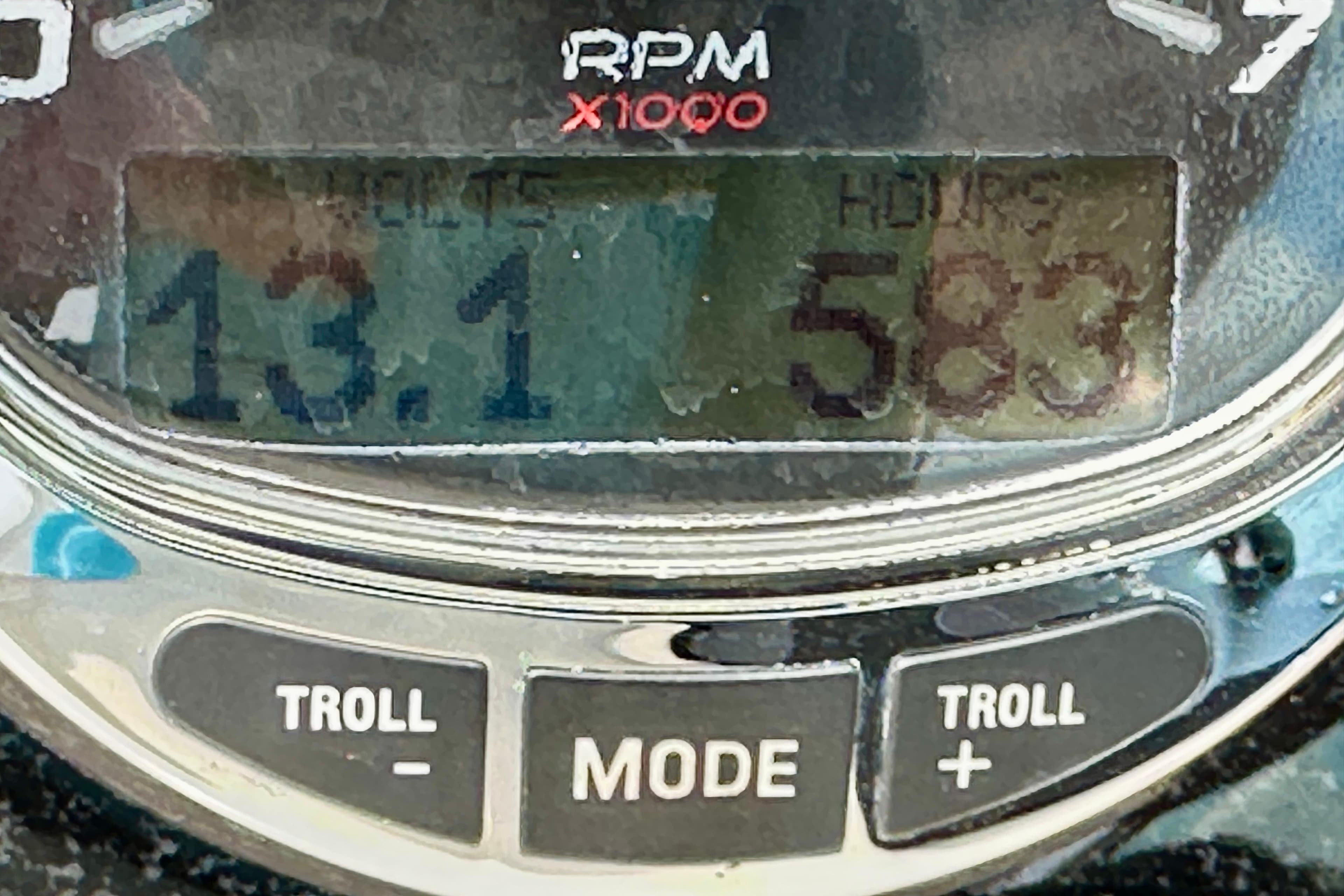 Close-up of a 2006 Sea Ray 260 Sundancer RPM gauge displaying 13.1 and 583 hours.