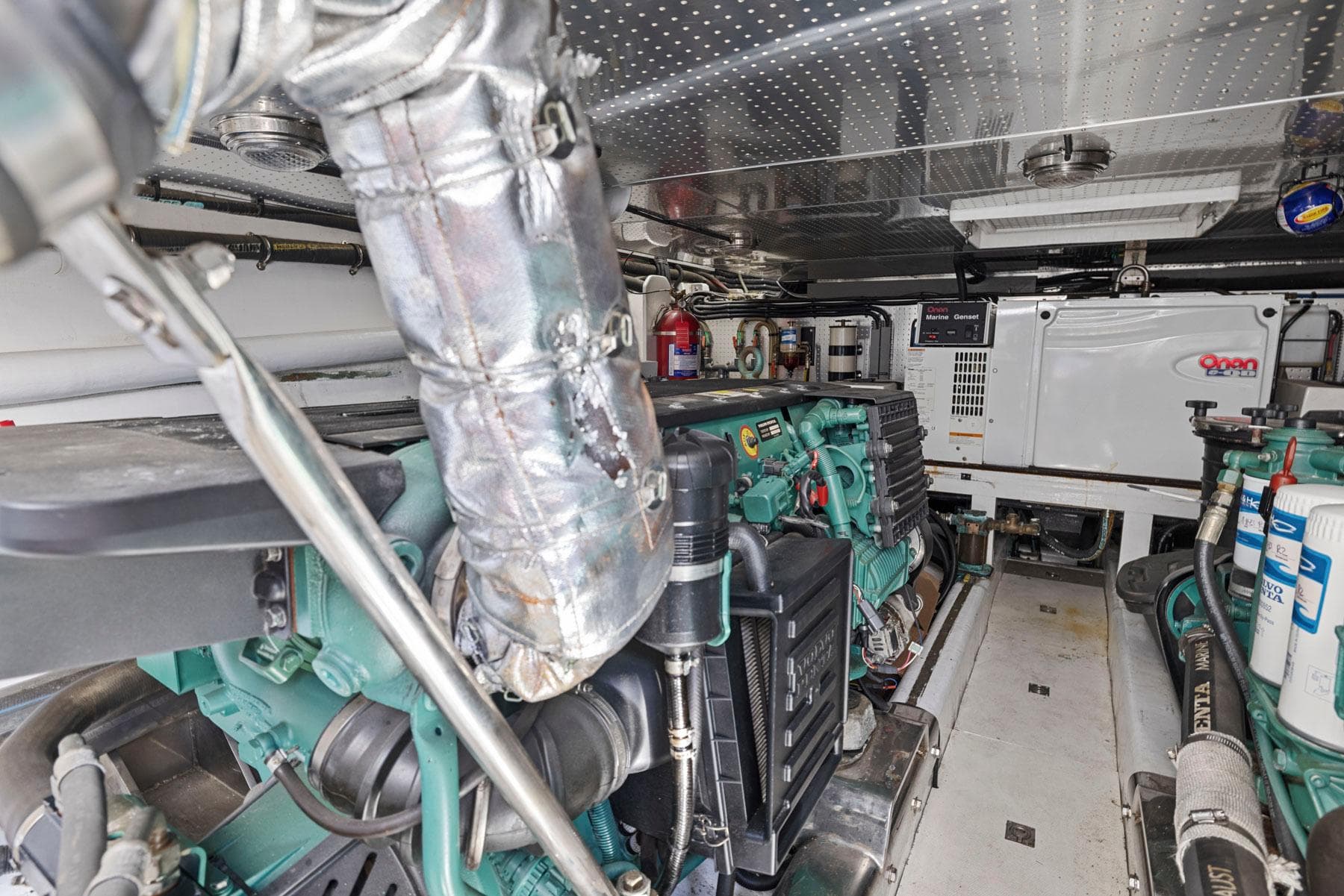 Engine room of a 2008 Dyna 51 yacht, featuring mechanical components and equipment.