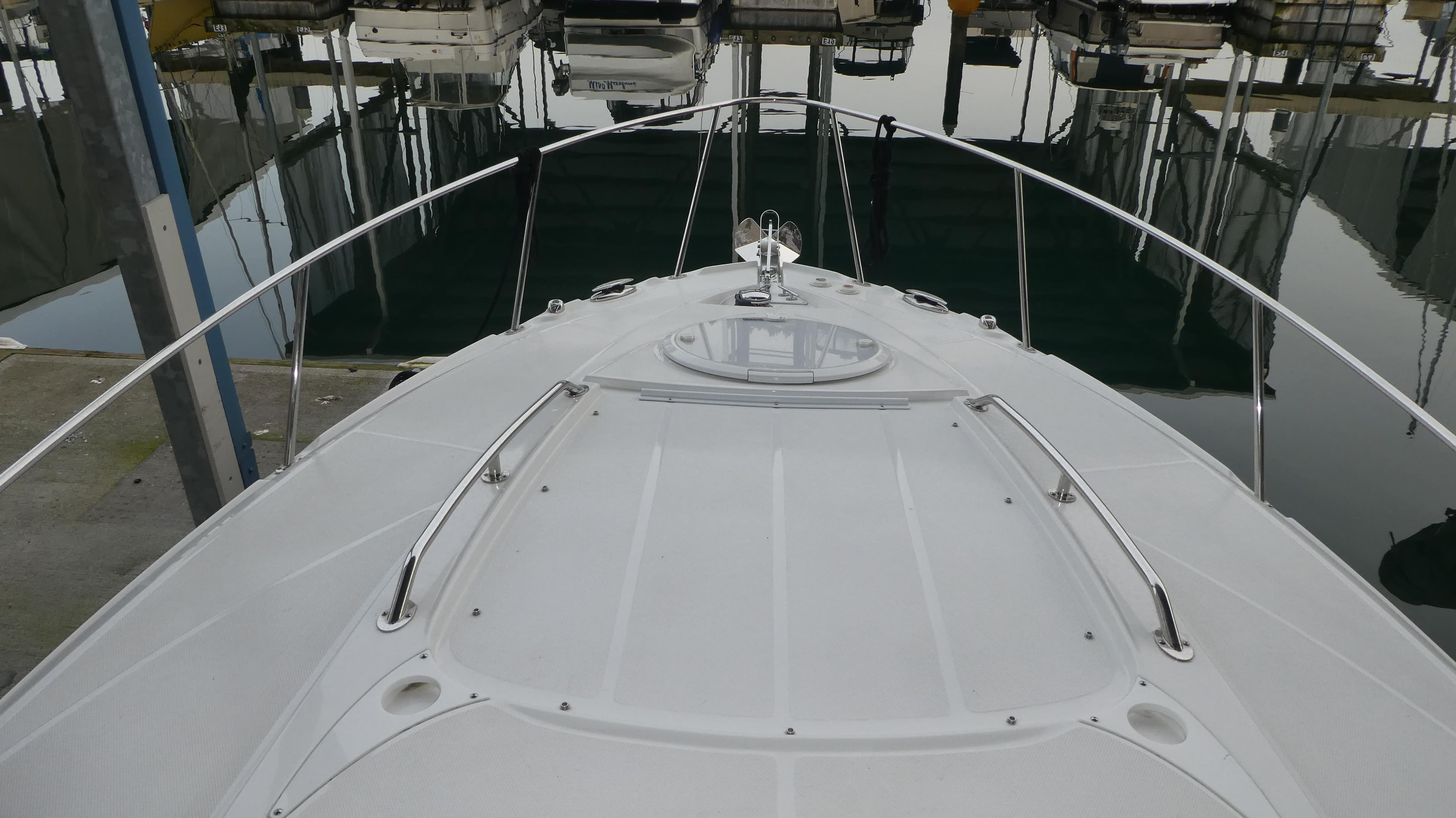 Foredeck of 2019 Monterey 295 Sport Yacht in marina.