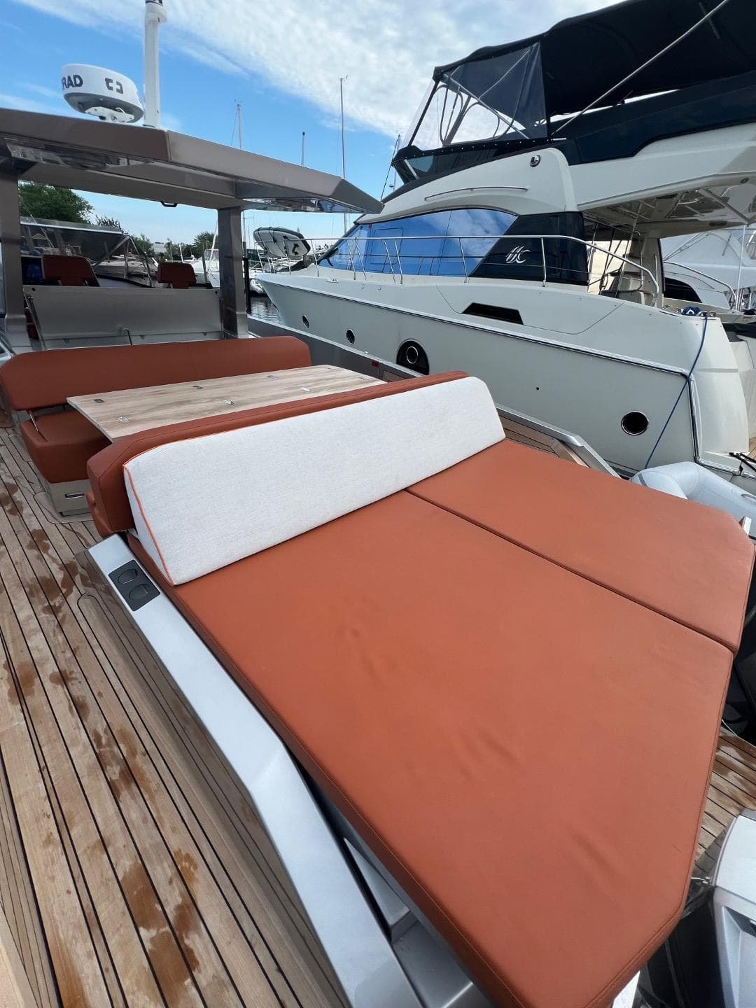 Luxury yacht Wally 48 X 2023 with elegant sun loungers.