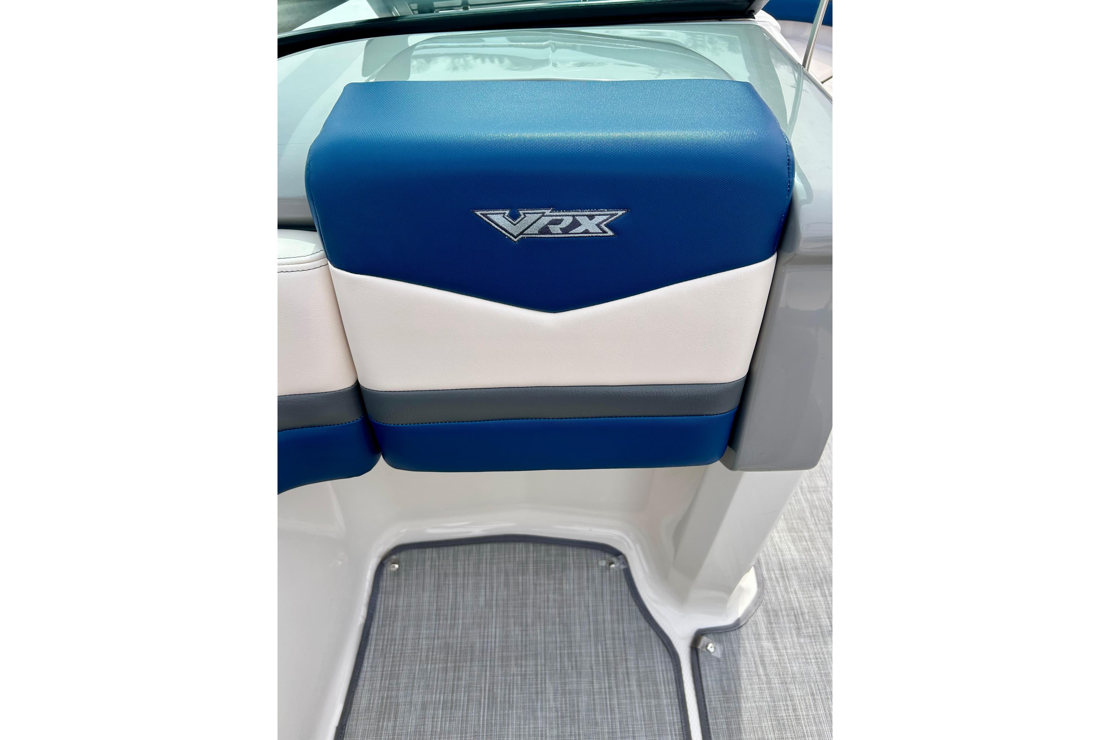 2017 Chaparral 203 Vortex VRX boat seat with blue and white upholstery.