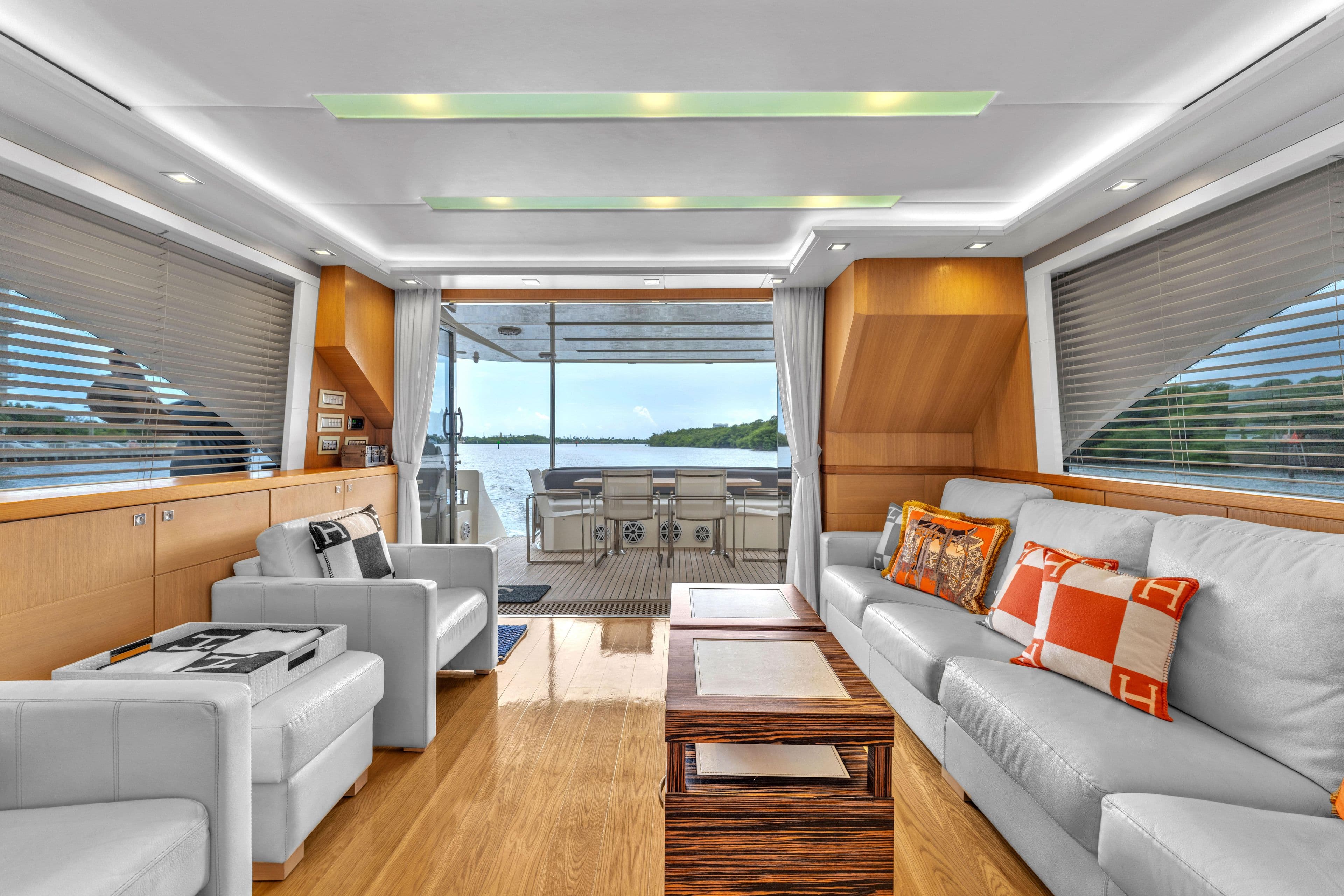 Luxurious interior of 2013 Astondoa 72 GLX yacht with modern furnishings and scenic view.