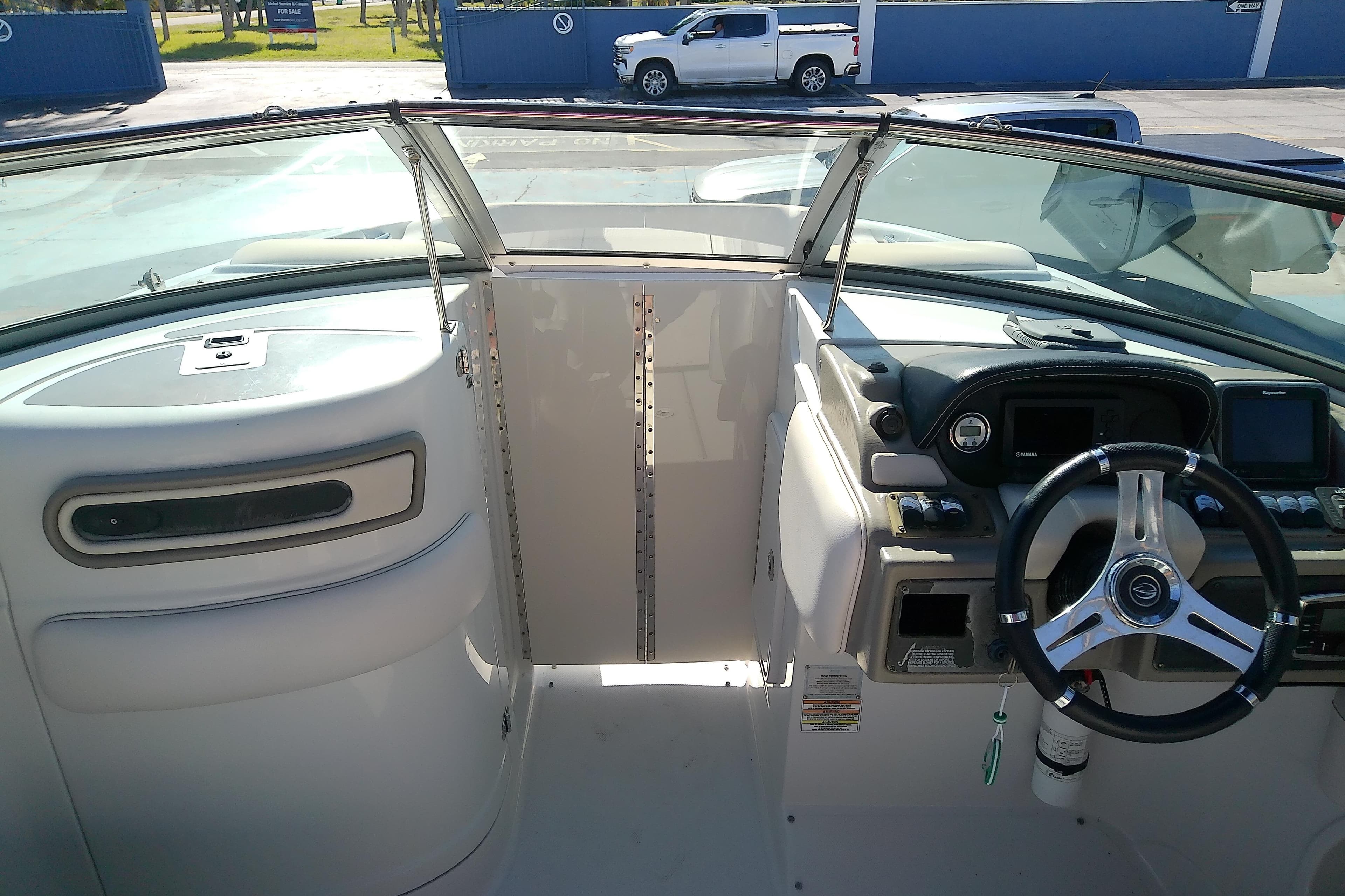 2017 Crownline Eclipse E6 XS boat interior with steering wheel and dashboard.