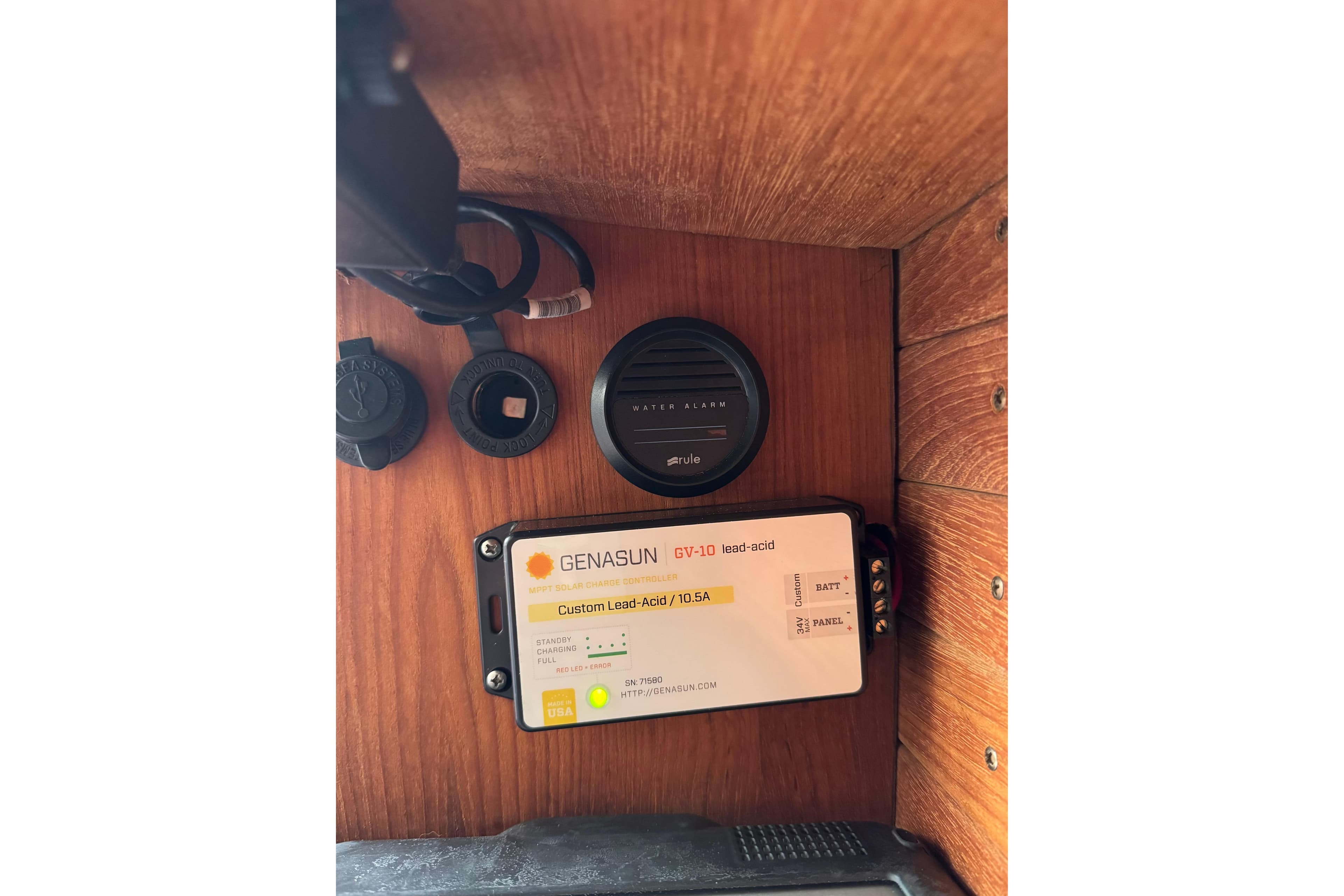 Genasun GV-10 solar charge controller in 2017 Alerion Express 28 sailboat interior.