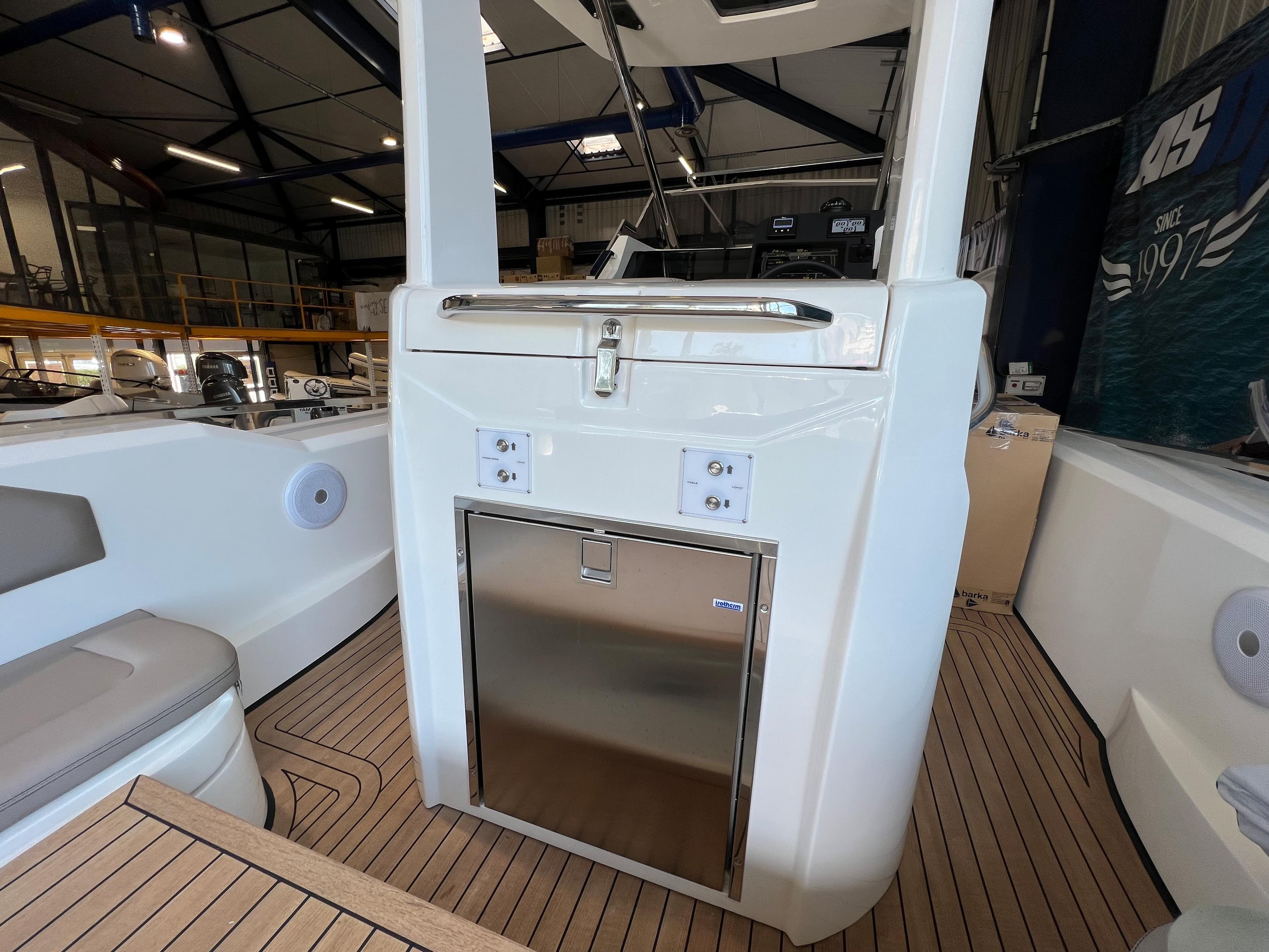 2023 Lomac GranTurismo 12.0 boat interior with sleek cabinetry and modern design.