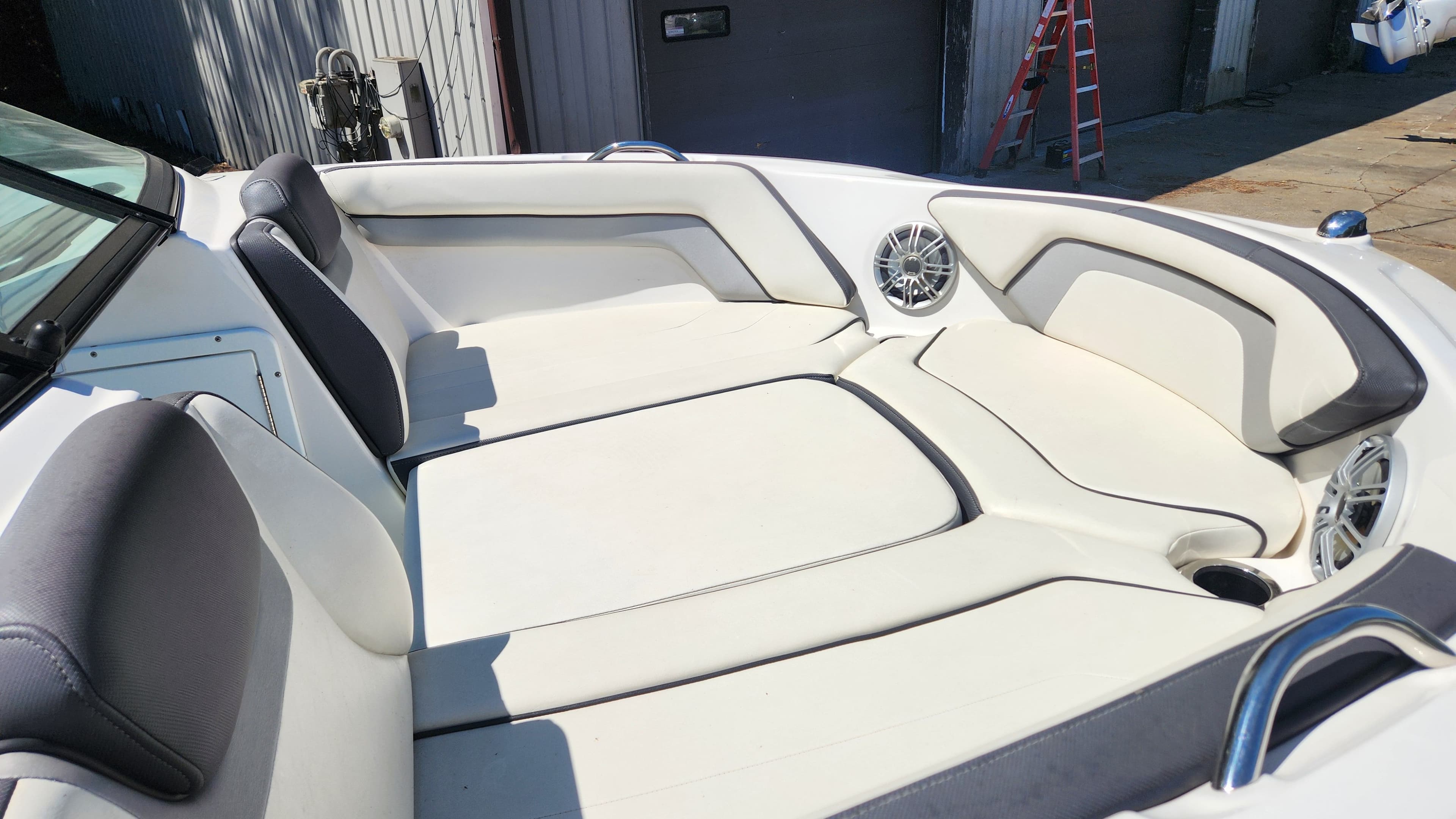 Interior of a 2016 Yamaha AR192 boat with white seating.