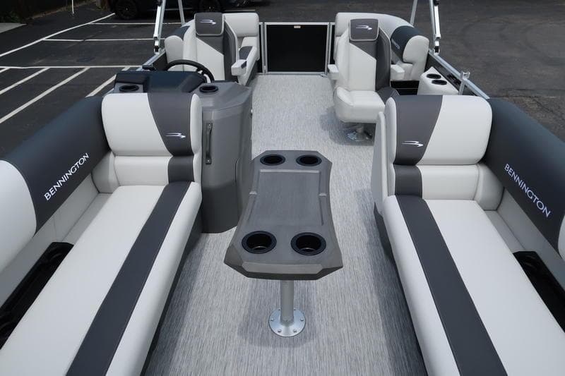 2026 Bennington S Quad Bench 20 SSR pontoon boat interior with gray and white seating.
