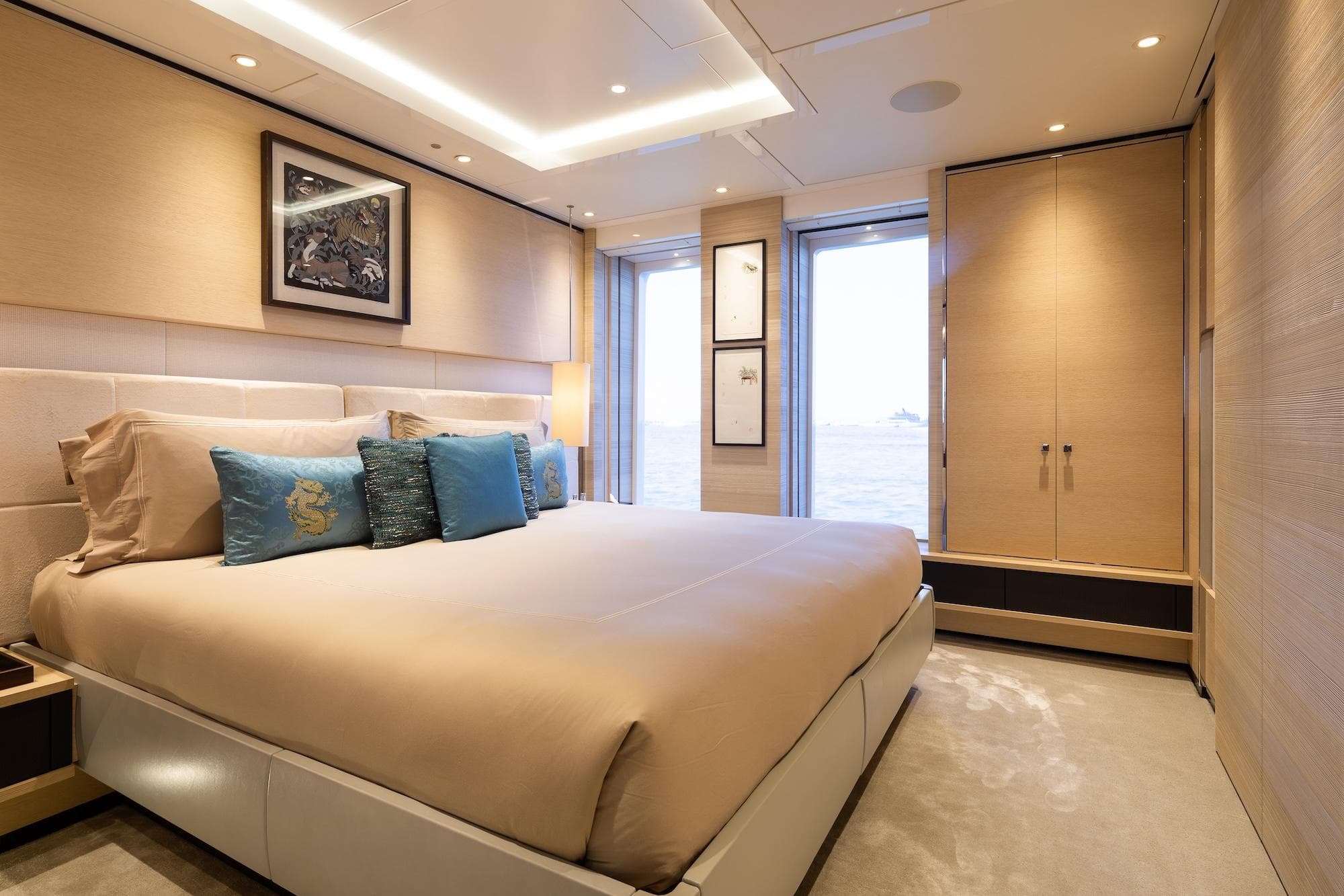 Luxurious bedroom interior on Alia Yachts 60M, 2016 model, featuring elegant design and ocean view.