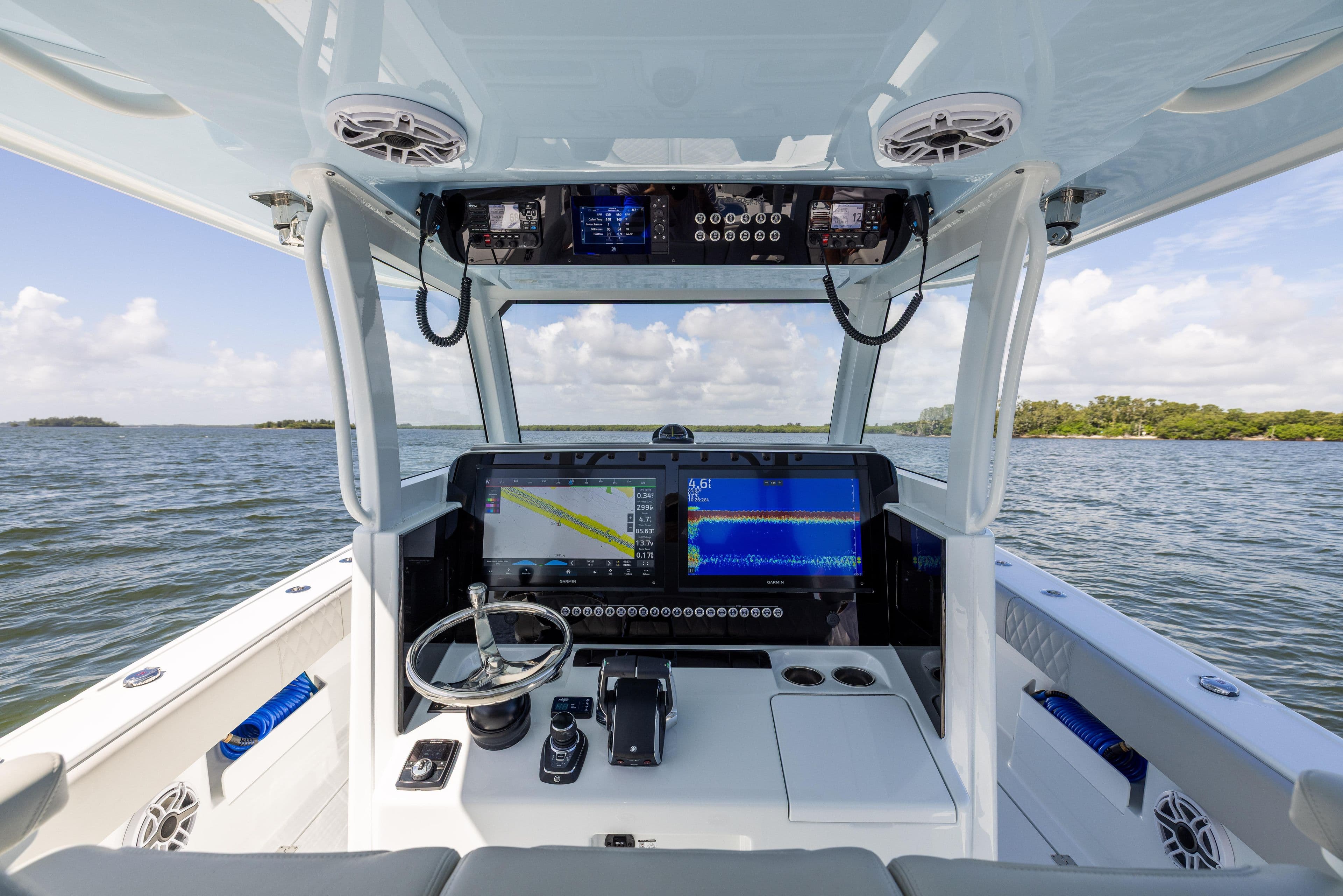 Interior view of 2024 Freeman 35 boat cockpit with advanced navigation system.