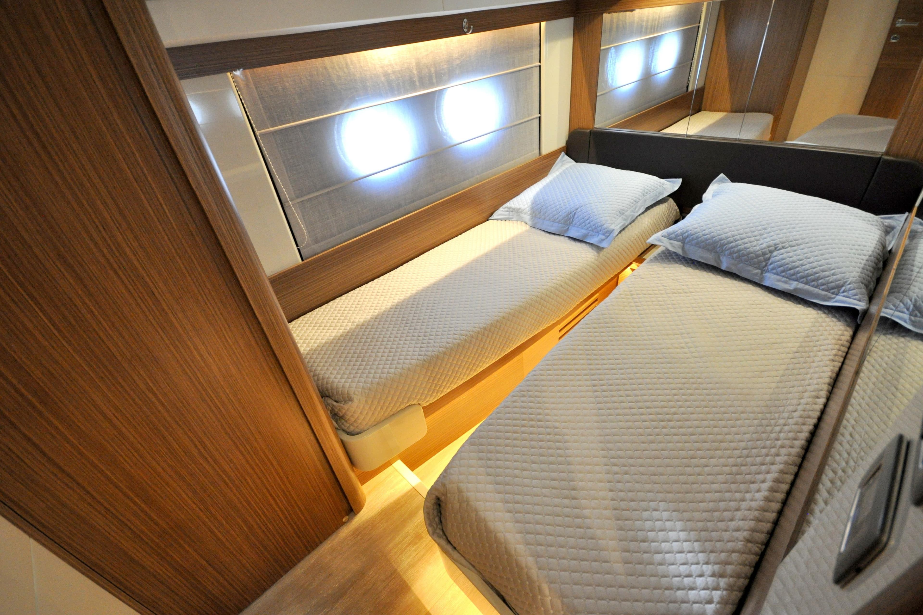 Luxurious twin cabin interior on 2018 Absolute Navetta 52 yacht.