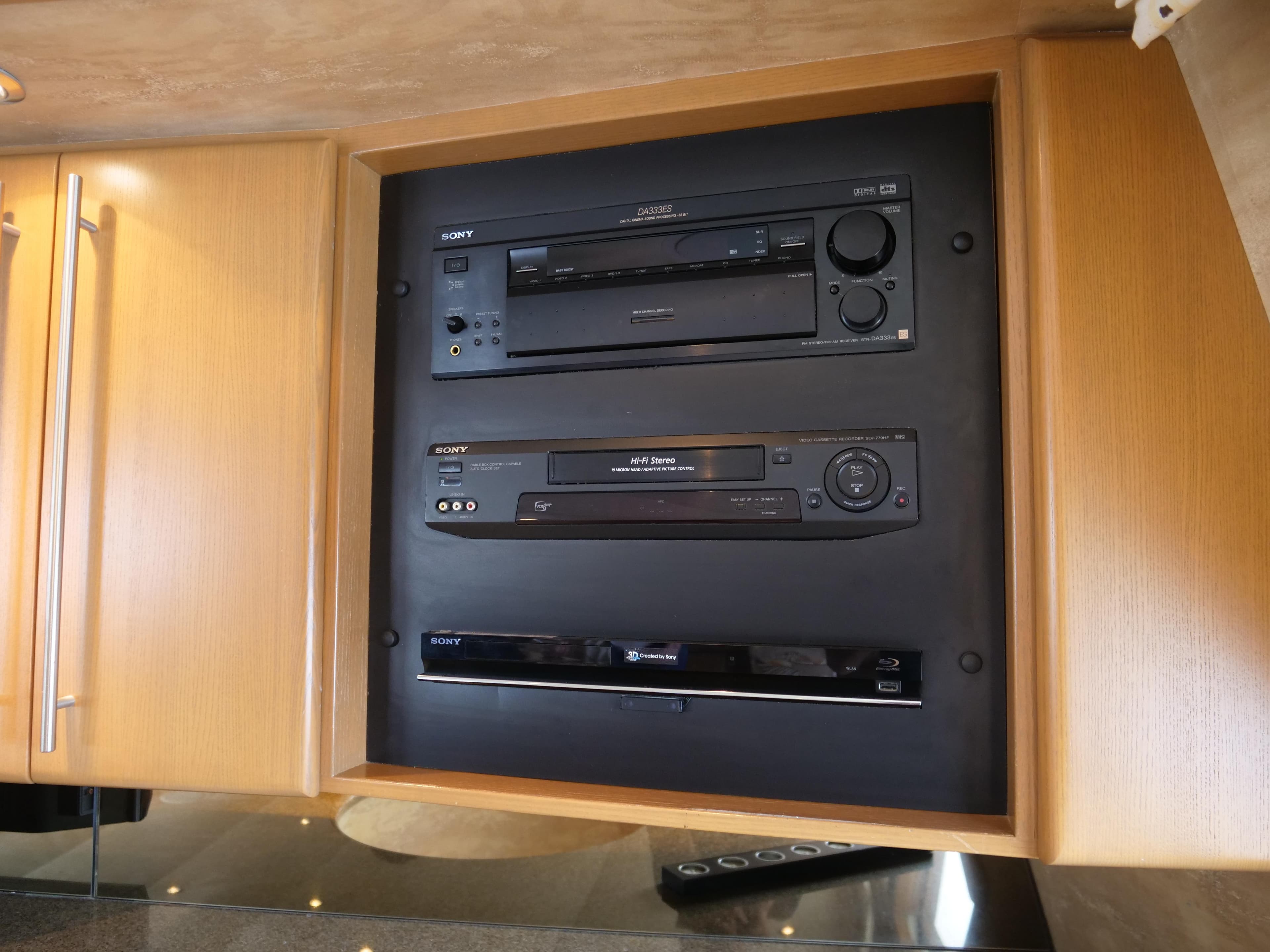 Built-in entertainment system in a 2000 Westport 112 yacht.