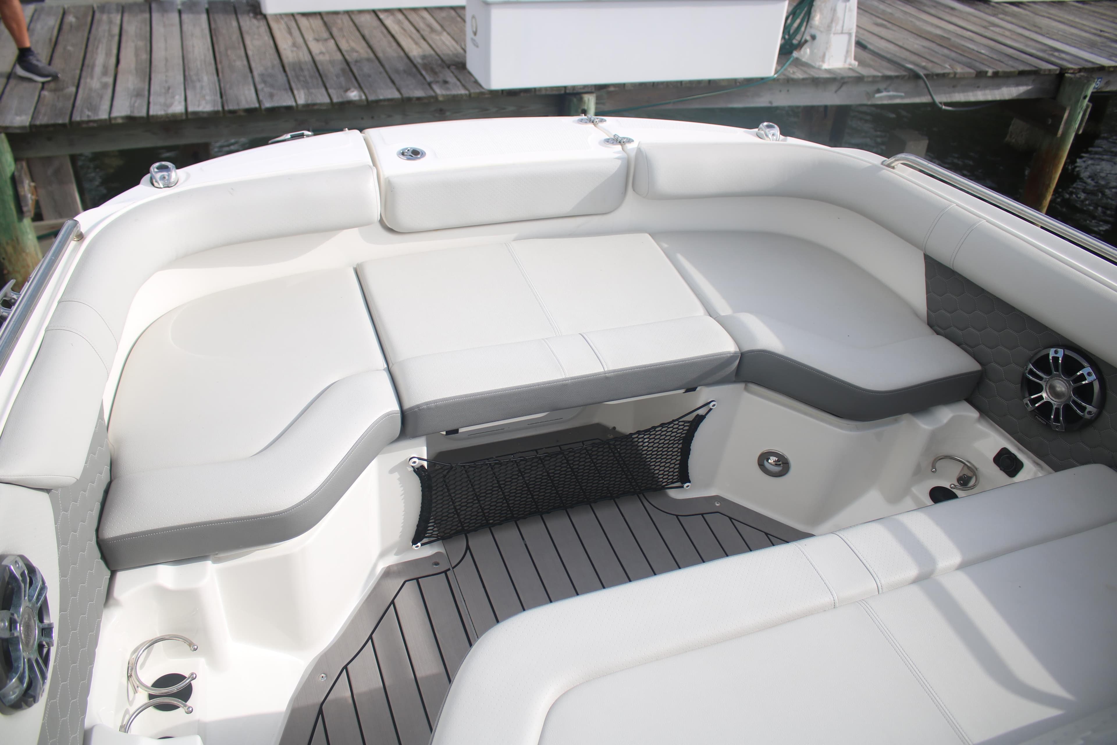 2022 Sea Ray 250 SDX-OB boat interior with cushioned seating and modern design.