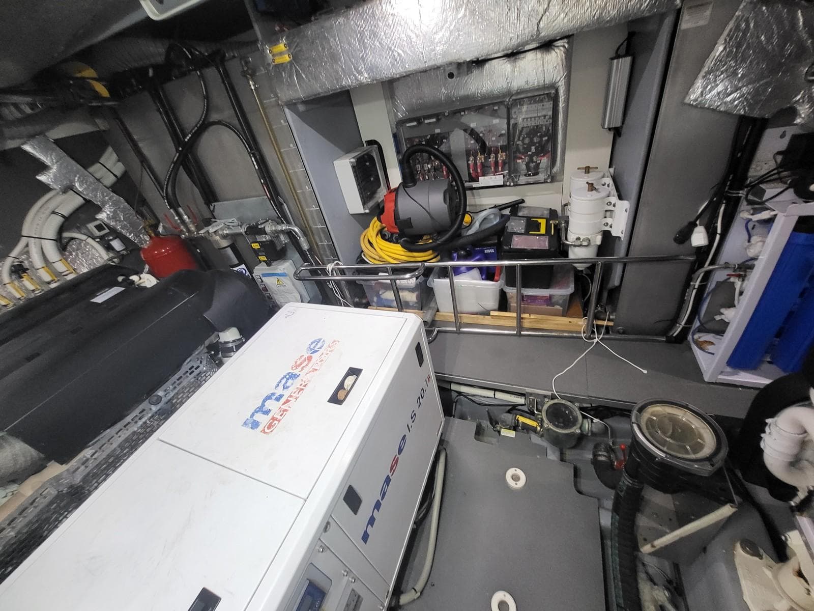 Engine room of 2017 Absolute NAVETTA 58 yacht, featuring equipment and wiring.