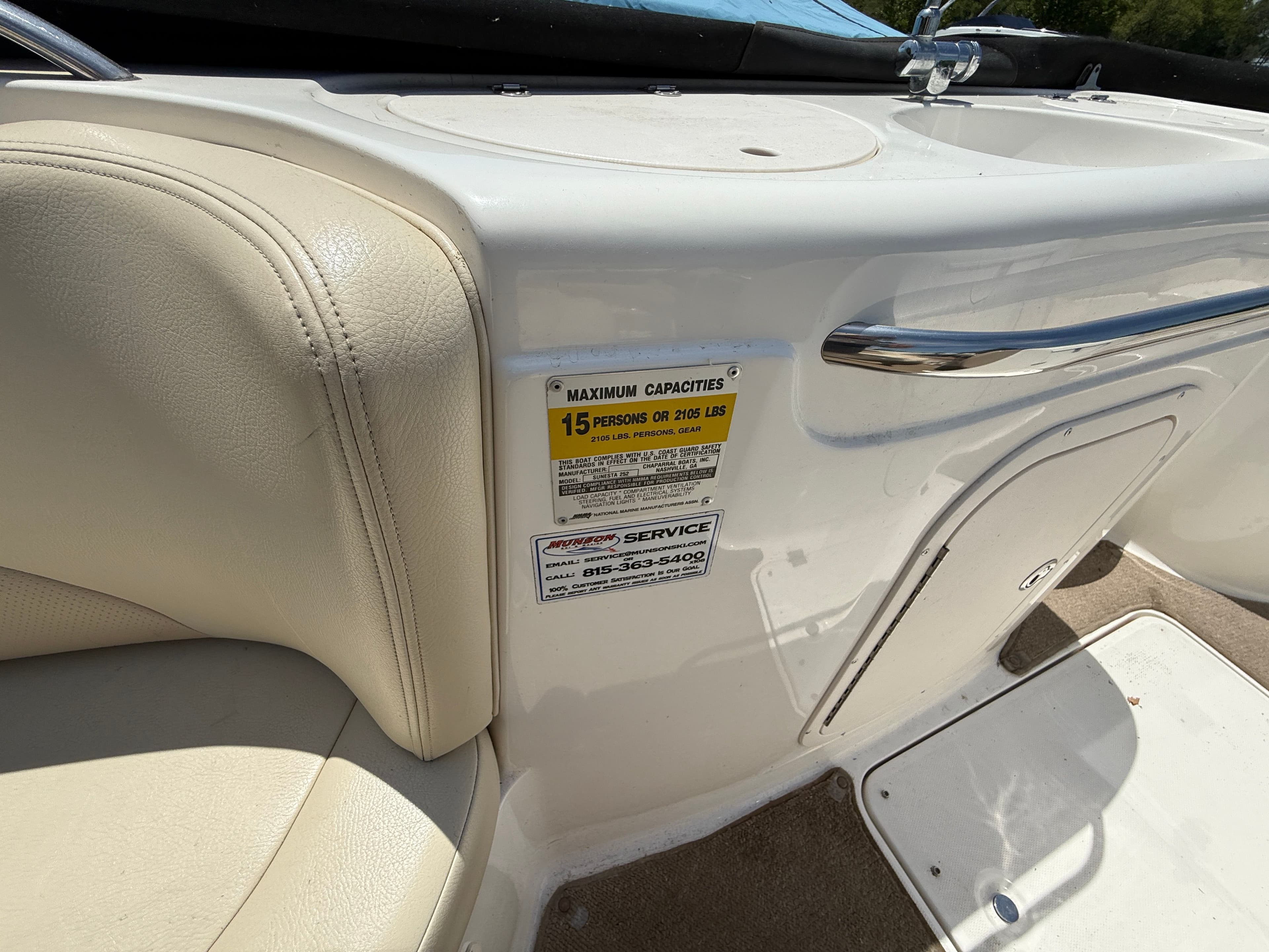 Interior of a 2005 Chaparral 252 Sunsesta with capacity label.