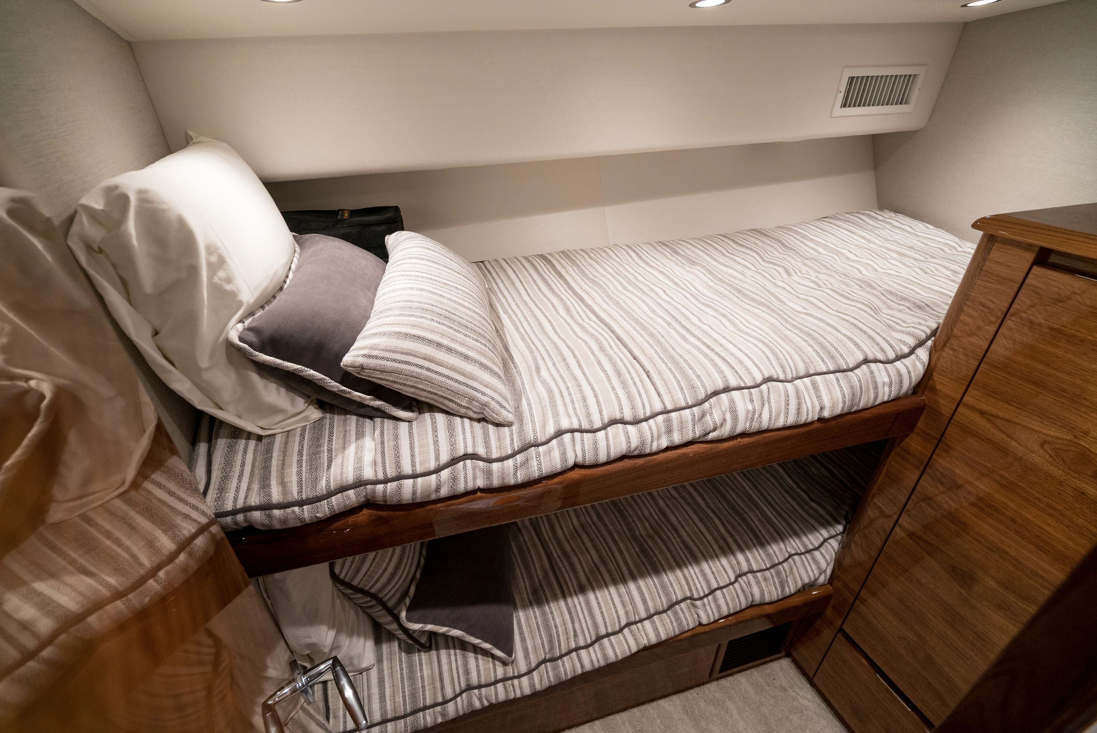 Interior of 2025 Viking 48 Convertible with bunk bed.