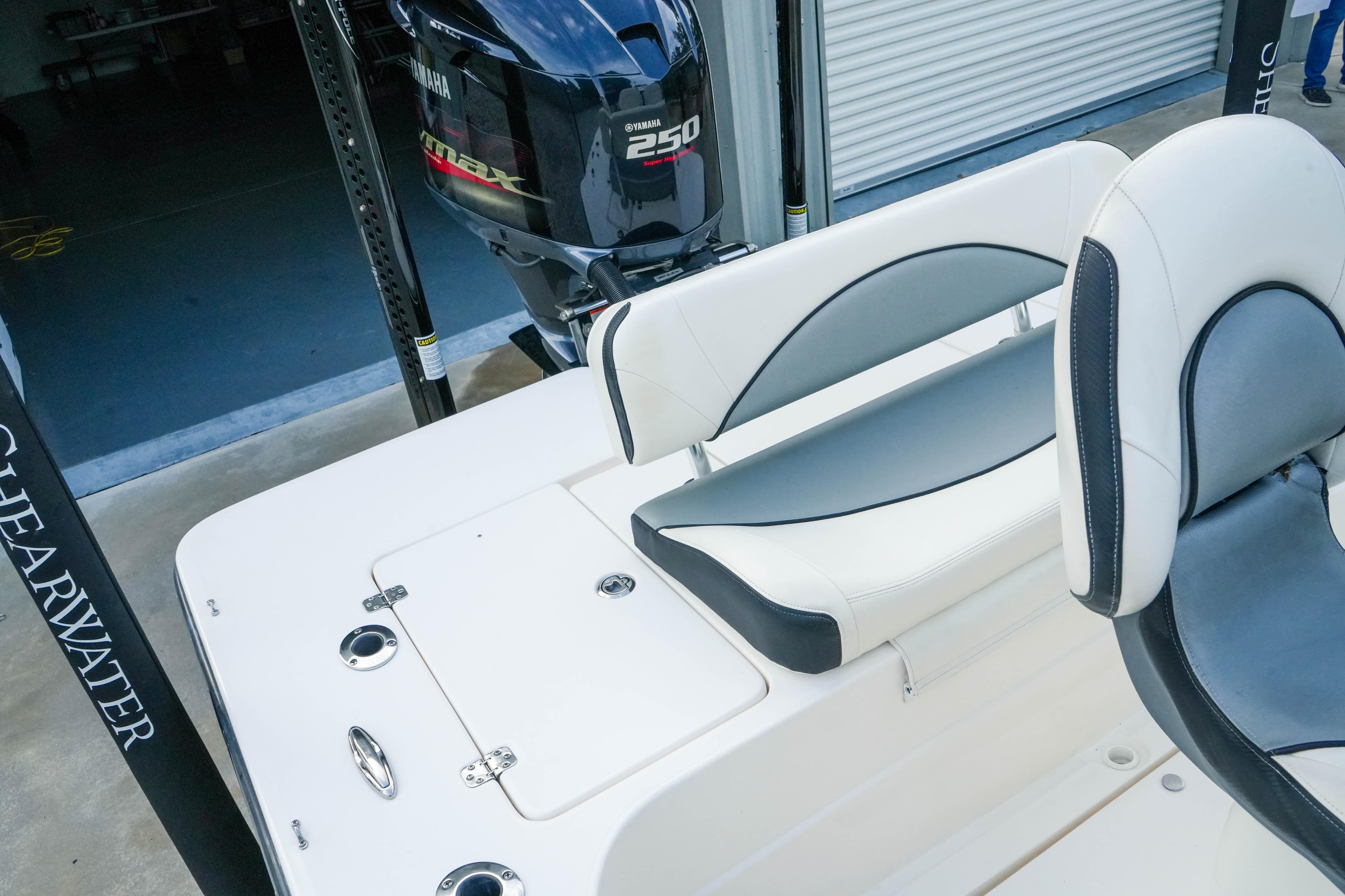 2017 ShearWater x22 boat interior with Yamaha 250 engine, featuring sleek seating design.