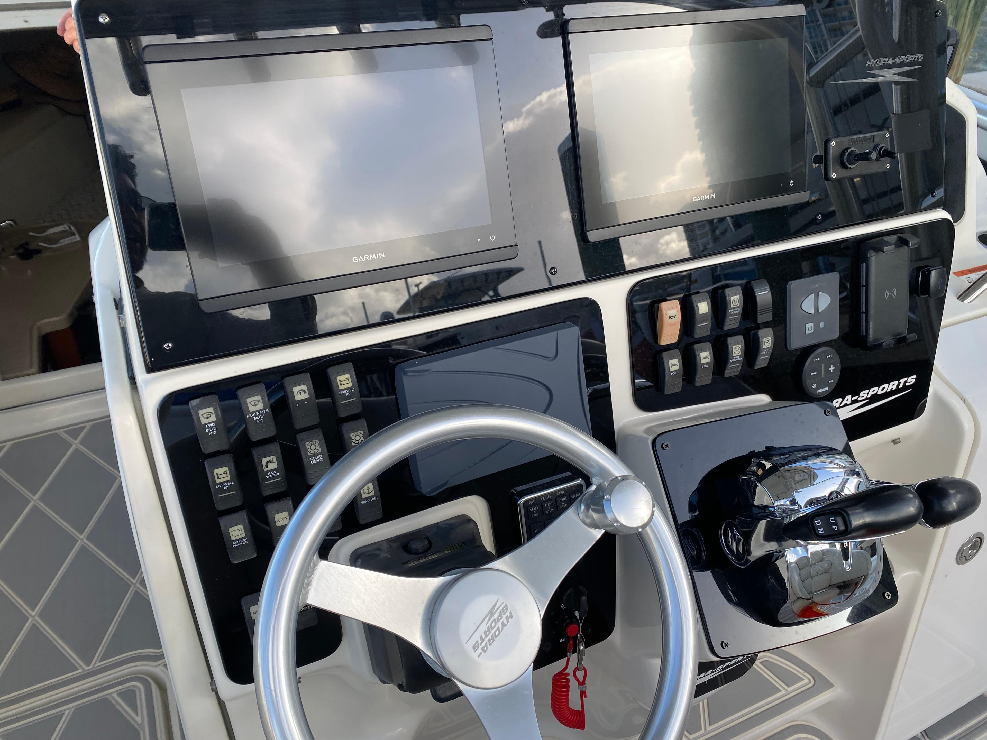 2006 Hydra-Sports Vector 3300 VX dashboard with Garmin displays and steering wheel.