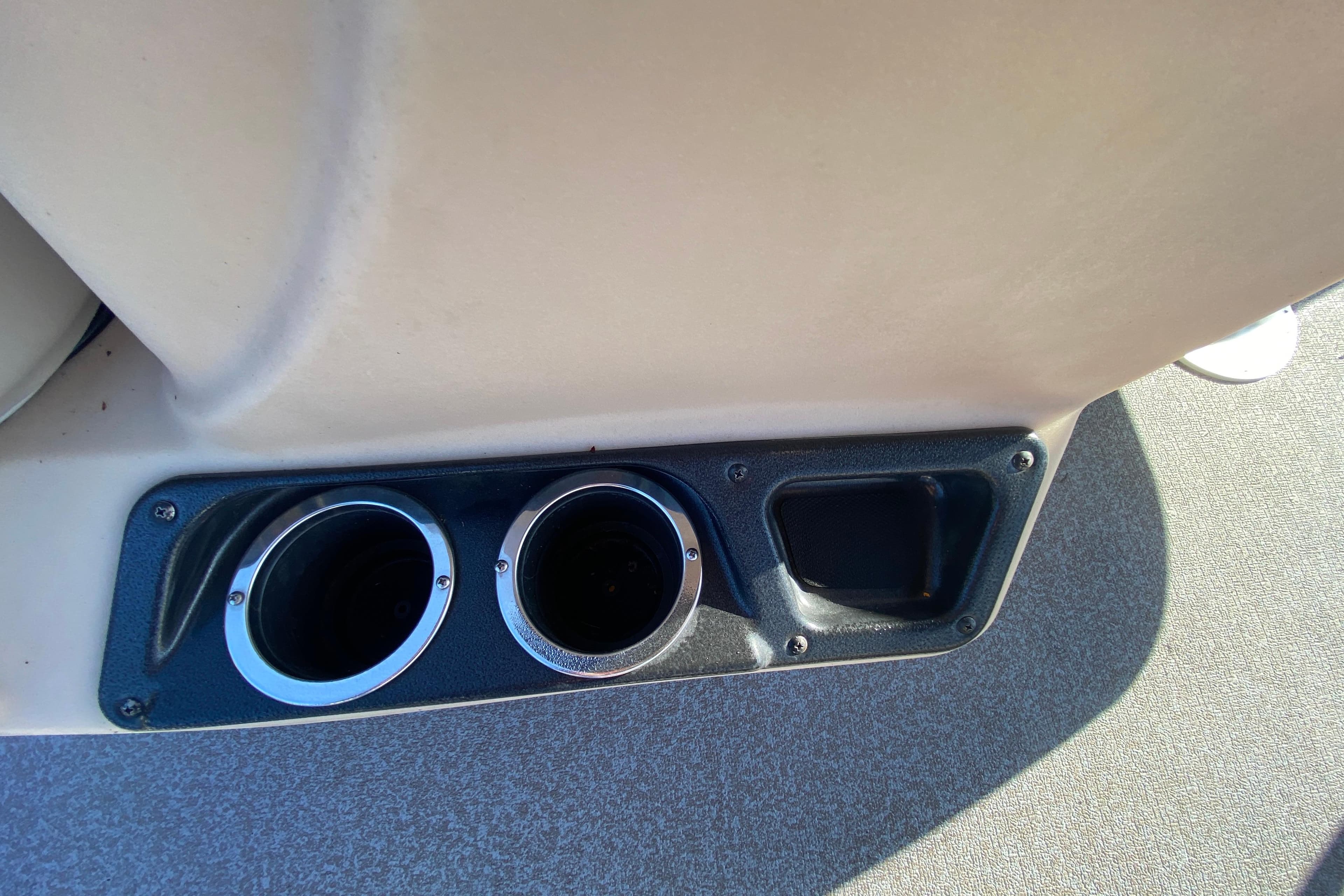 Cup holders on 2018 Sun Tracker Bass Buggy 18 DLX boat interior.
