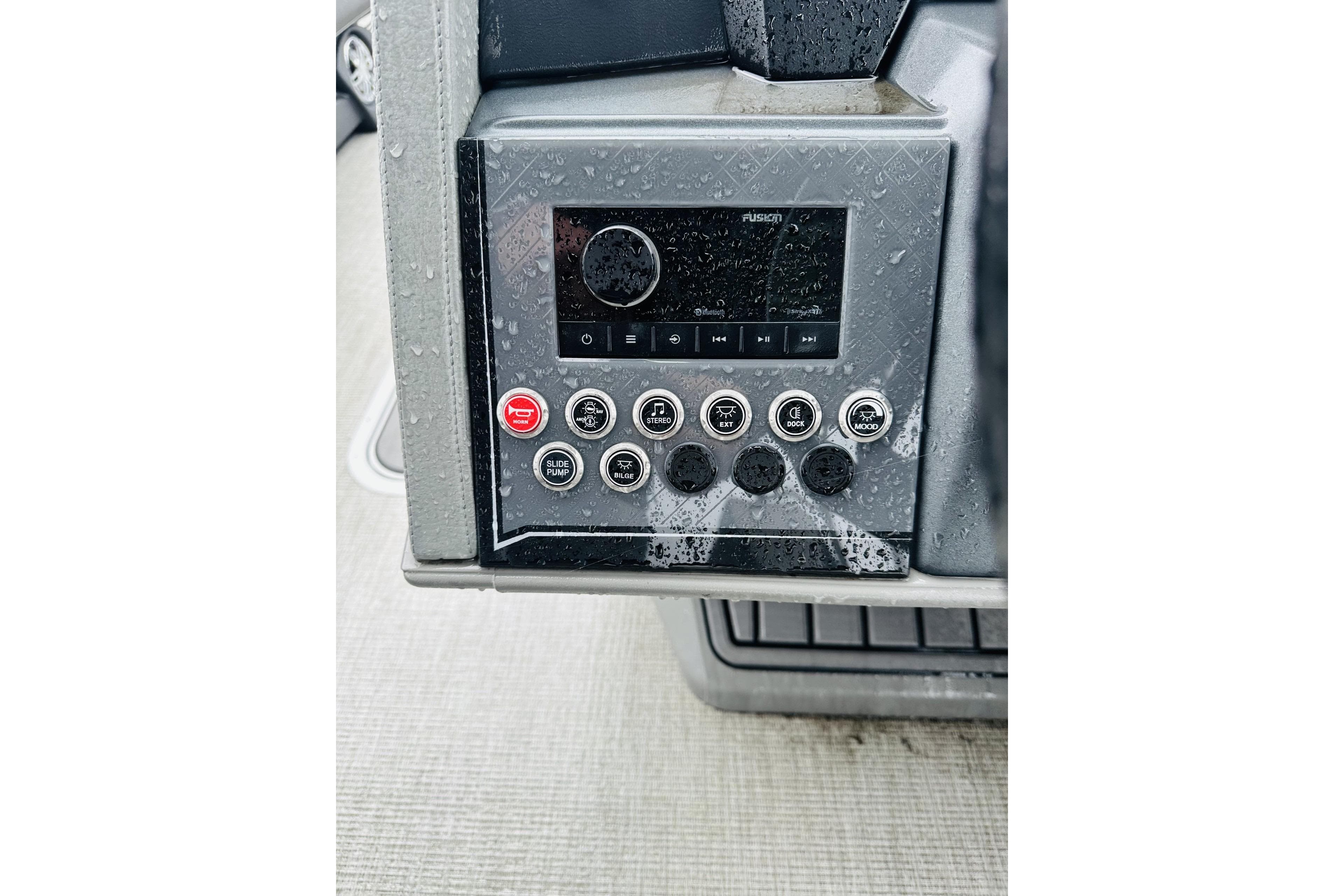 Control panel of 2025 Avalon Catalina Cruise Funship, featuring buttons and a digital display.