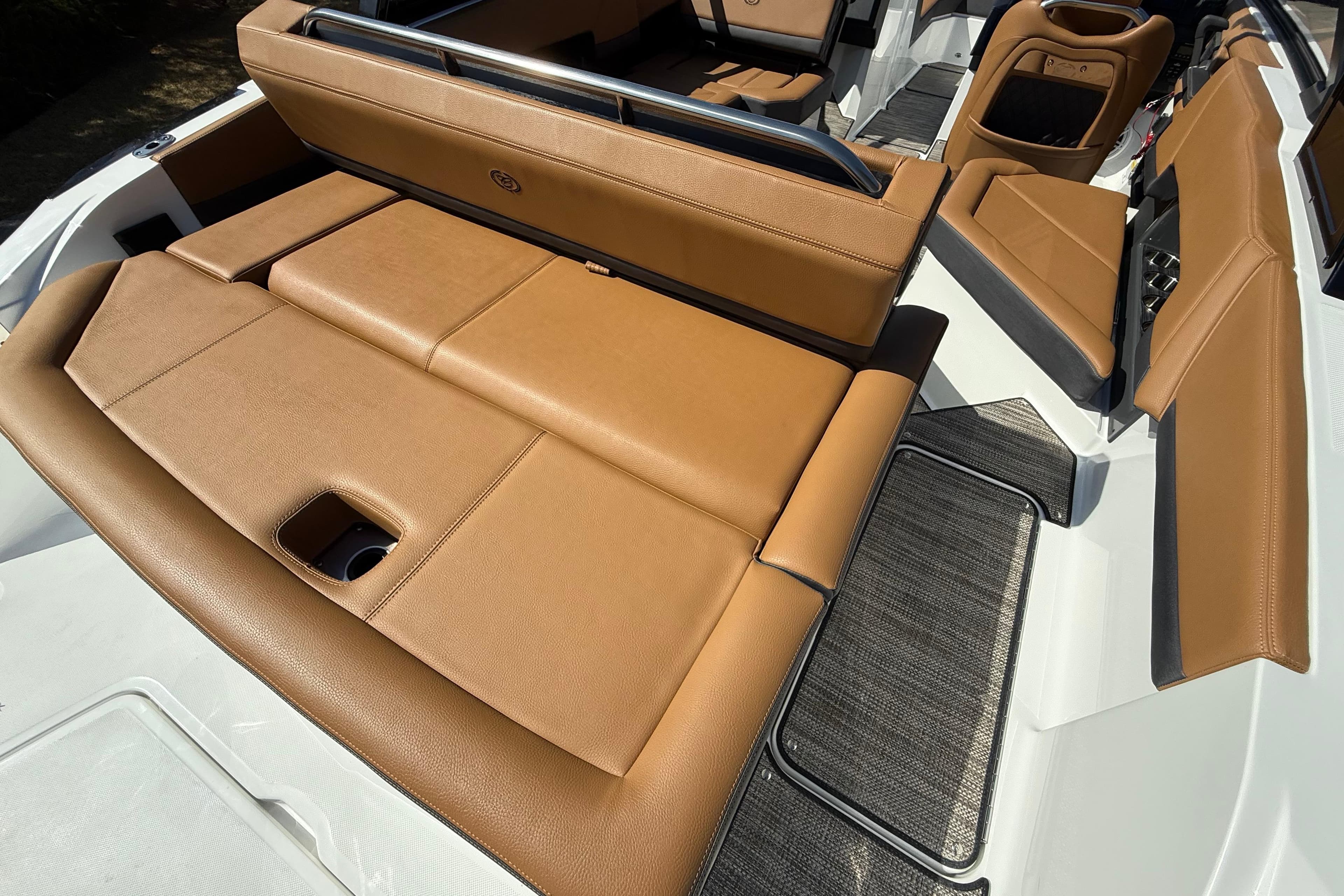 Luxurious interior of 2025 Cobalt R4 boat with tan leather seating.