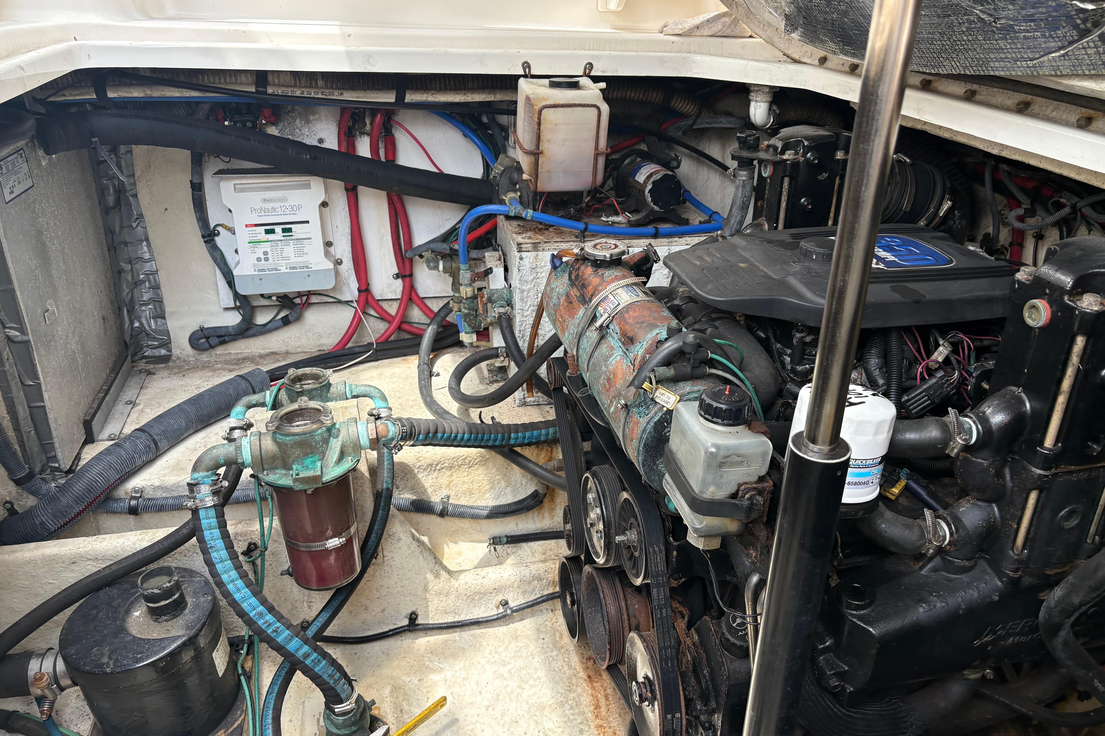Engine compartment of a 2008 Searay 290 AMBERJACK with visible wiring and components.