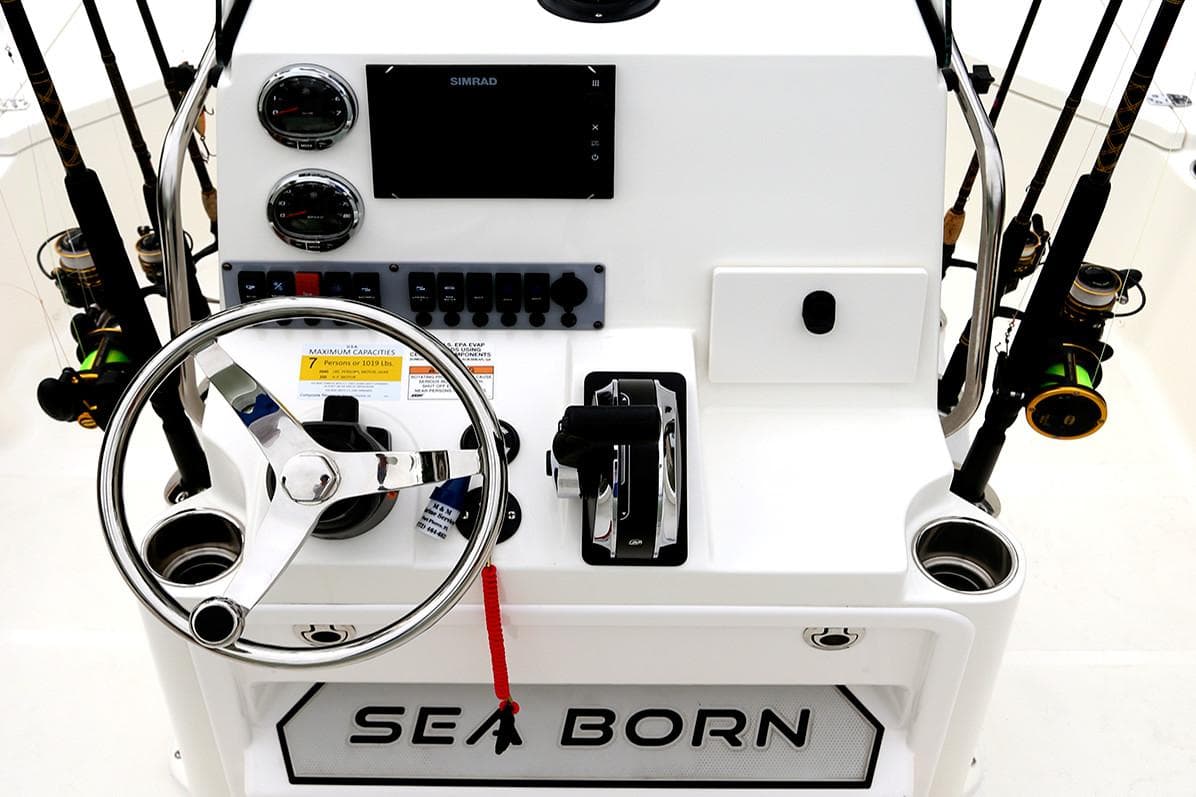 Manufacturer Provided Image: 2025 Sea Born FX22 Bay boat console with steering wheel and controls.