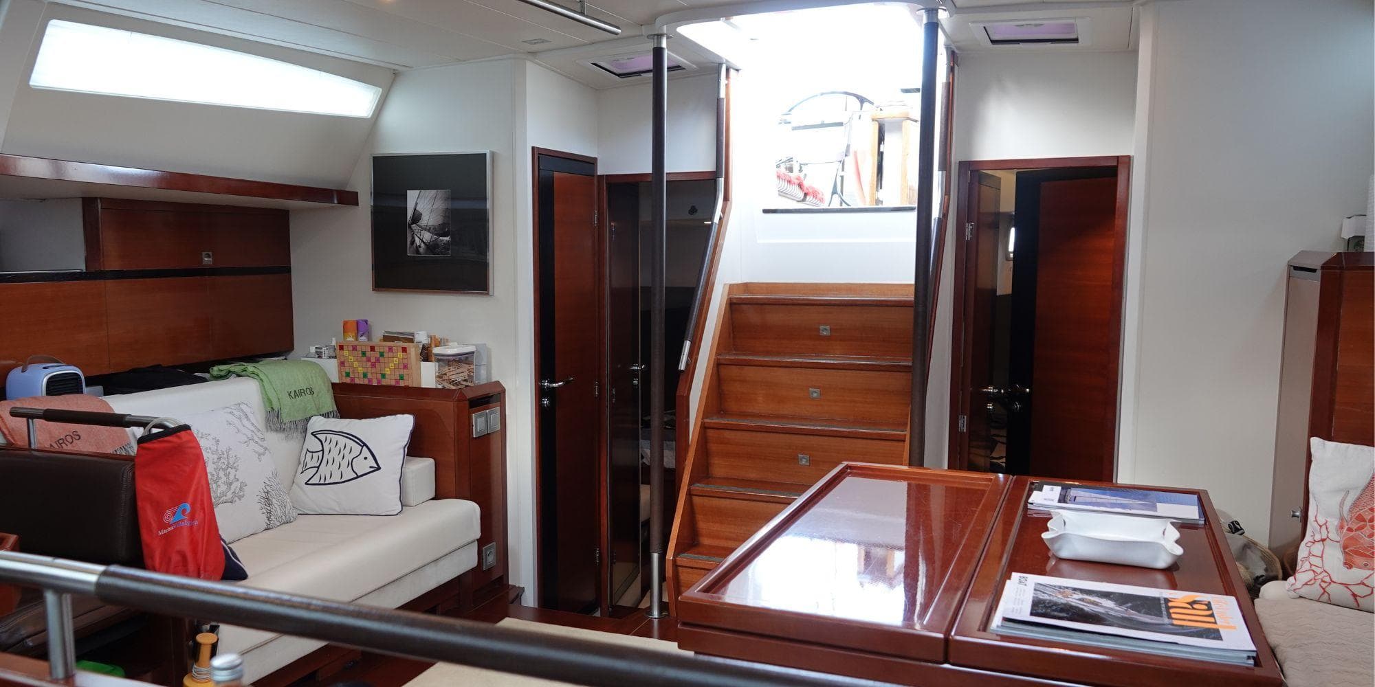 Luxurious interior of 2012 CNB BORDEAUX 60 yacht with elegant wood finishes and modern design.