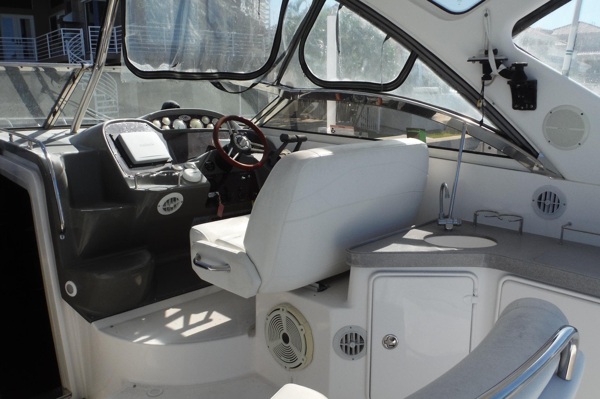 2008 Regal Commodore 3760 IO boat interior with helm, seating, and dashboard.