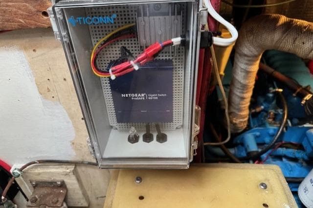 Electrical setup on a 1979 CAL 39 MK II Tall Rig sailboat, featuring a Netgear switch.
