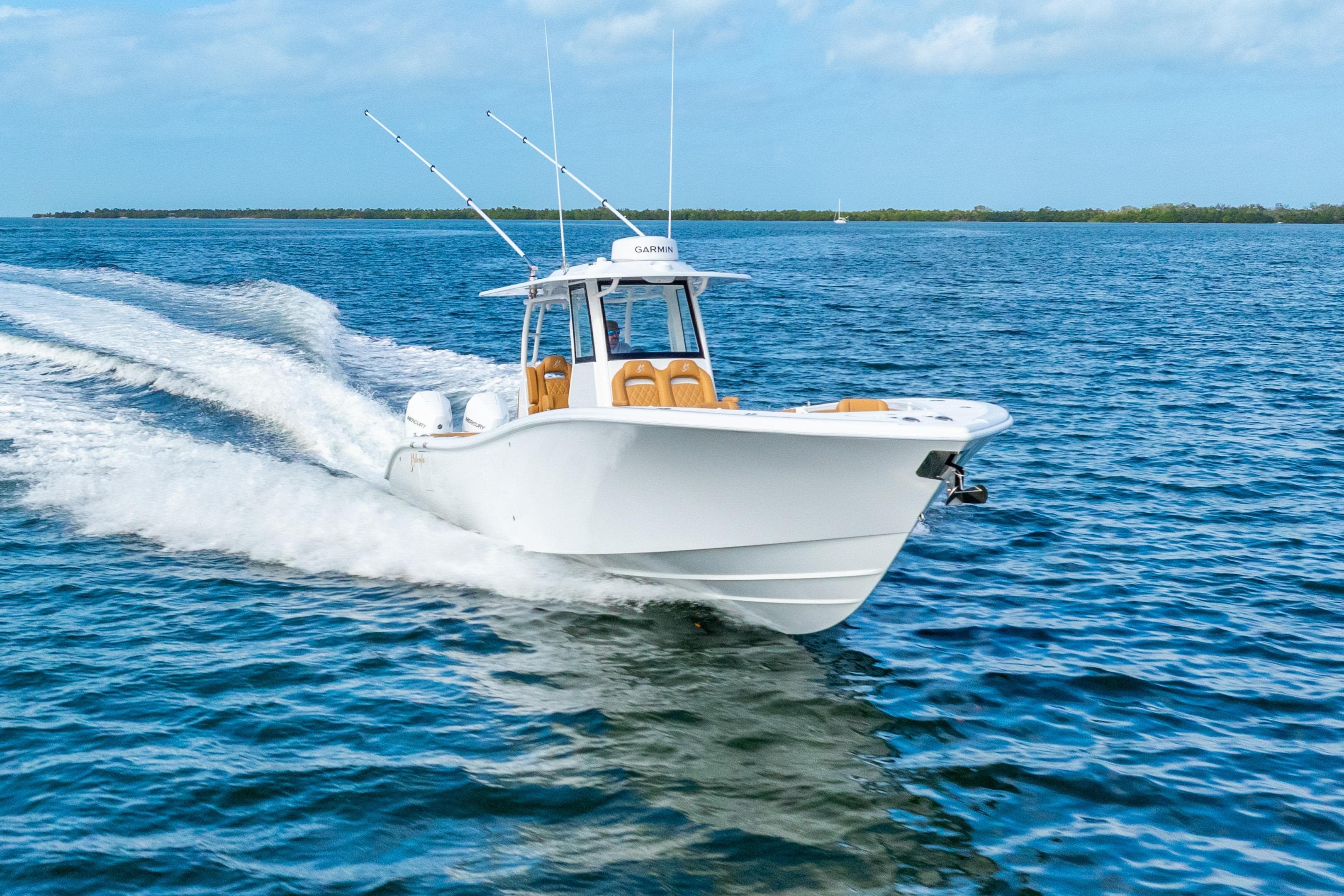 2026 Yellowfin 36 Offshore boat cruising on open sea.