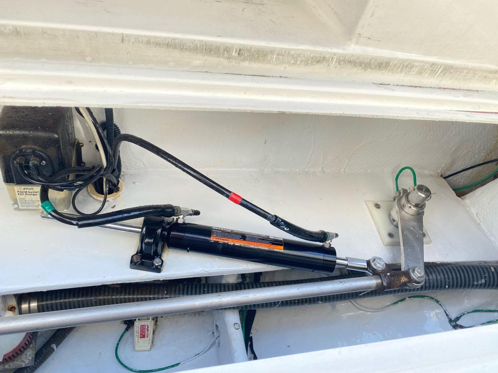 Hydraulic steering system in a 2005 Luhrs 38 Convertible boat.