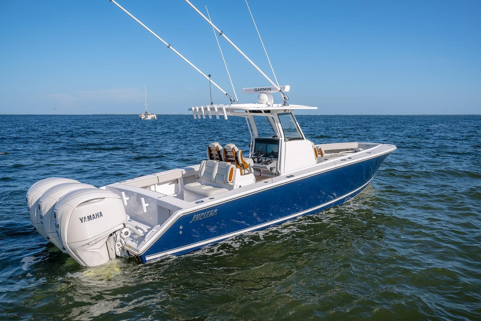 2026 Jupiter 340LS boat with Yamaha engines on open water.