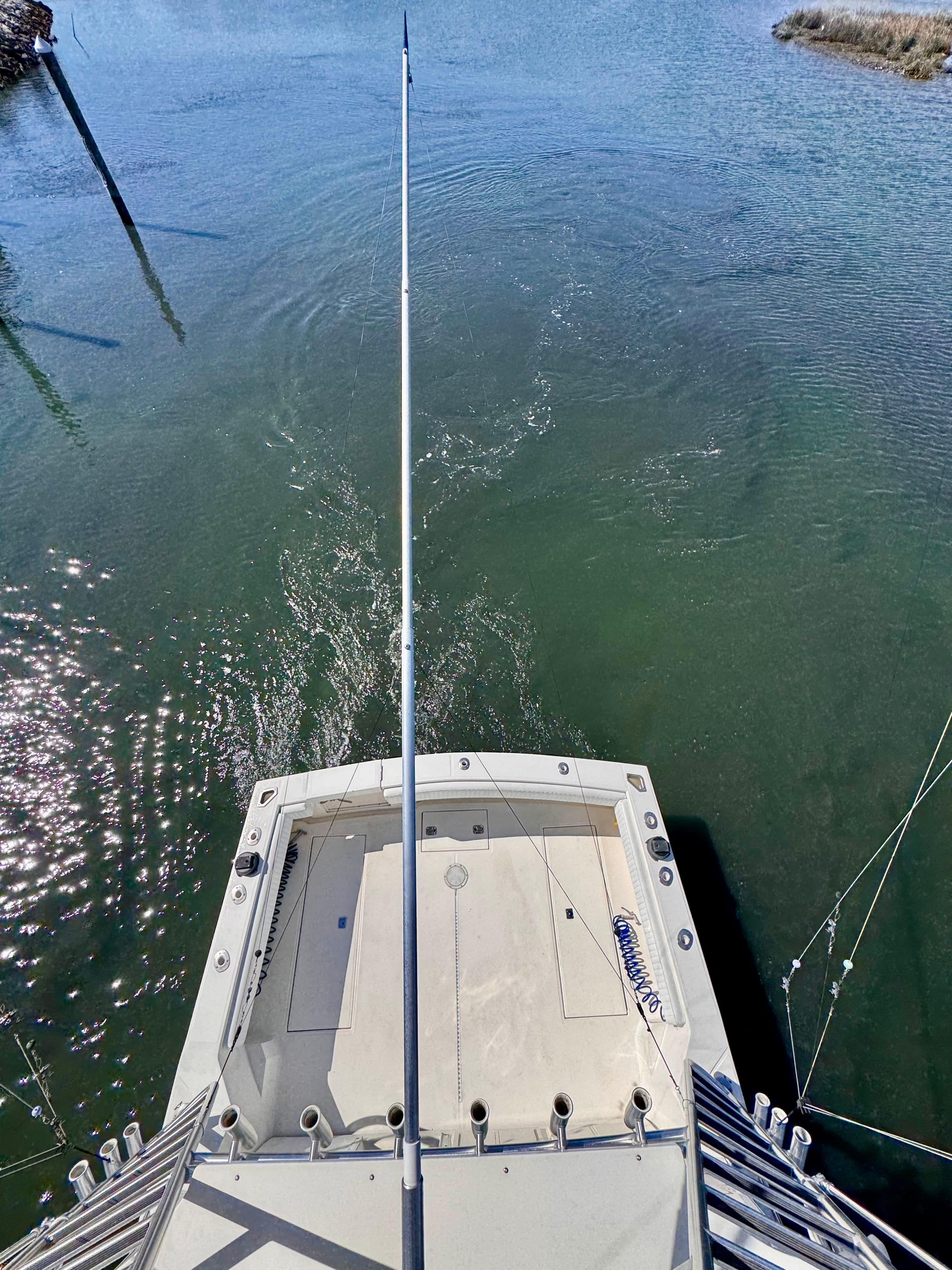 Rear view of a 2006 Carolina Classic Express boat on the water.