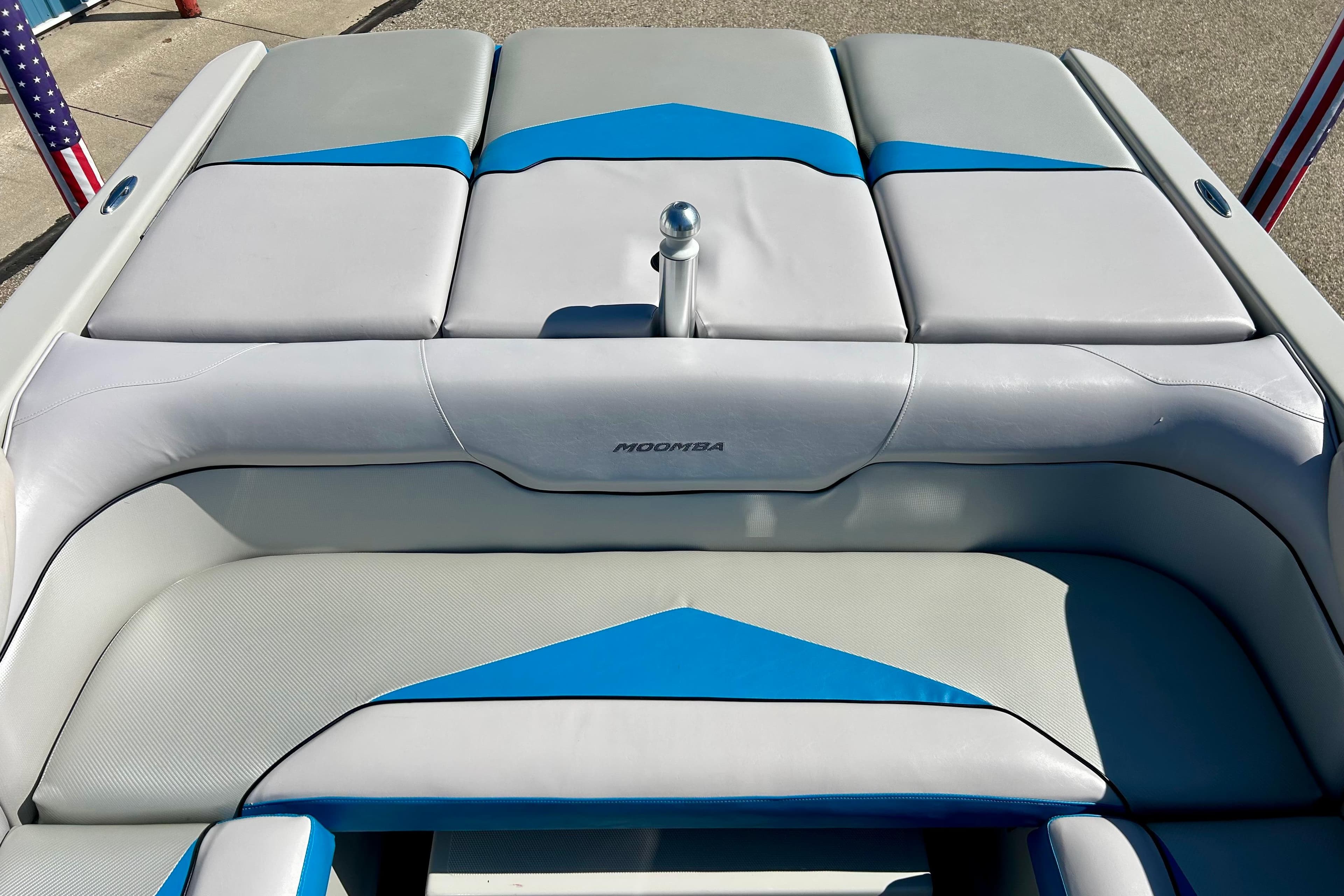 2012 Moomba Mojo 2.5 boat interior with gray and blue seating.
