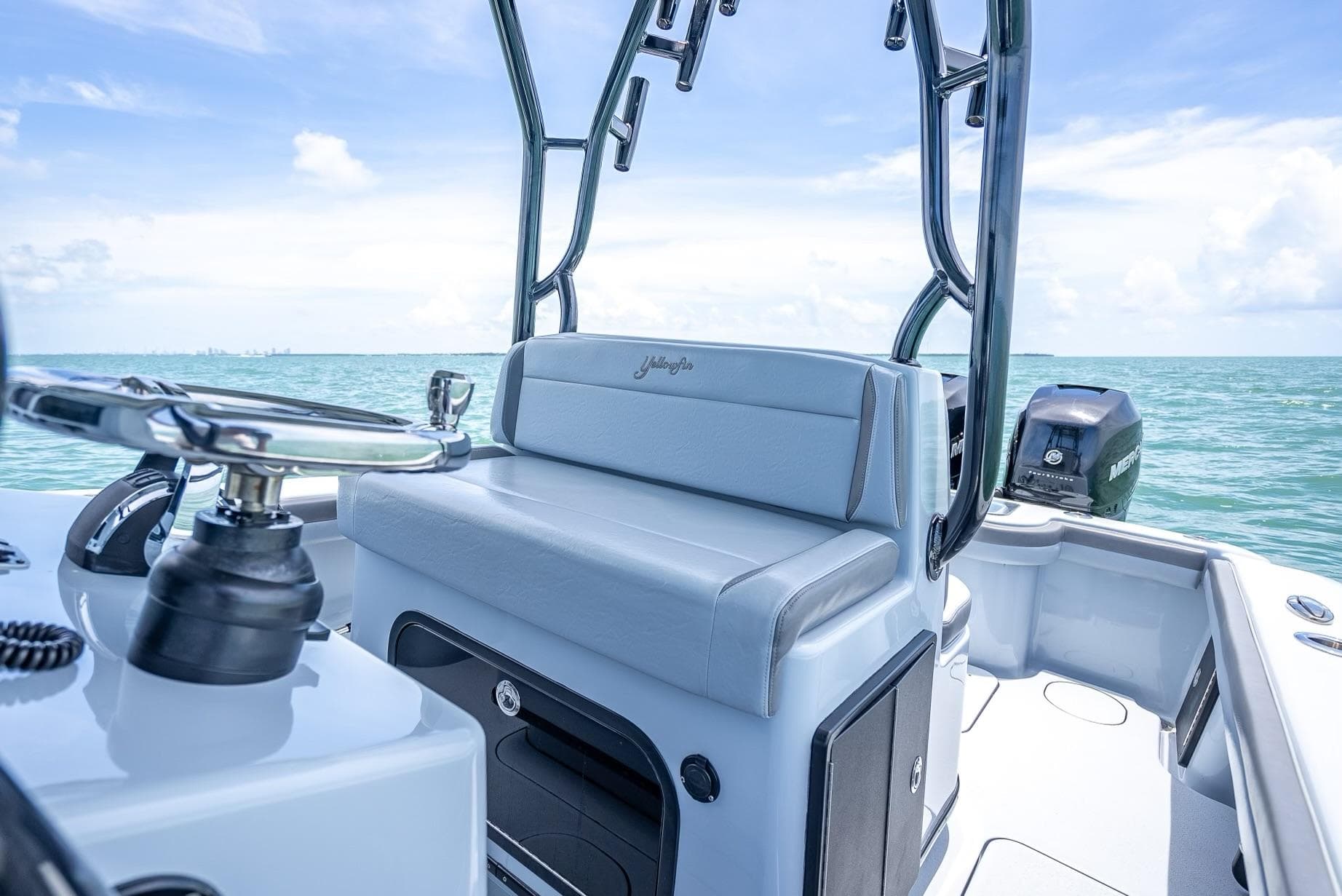 Interior view of a 2021 Yellowfin 29 Offshore boat on the sea.