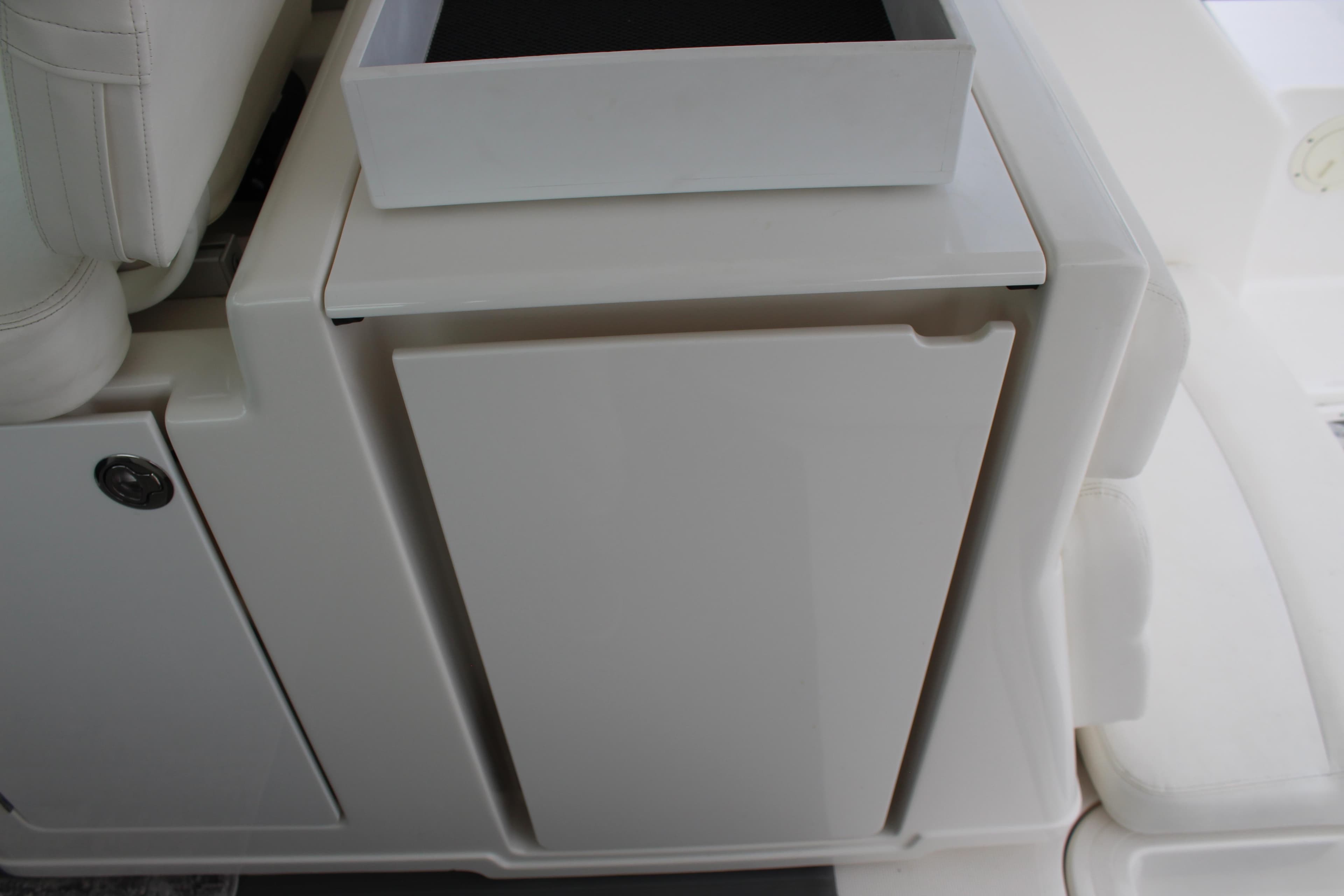 2002 Tiara Yachts 3800 Open interior storage compartment.