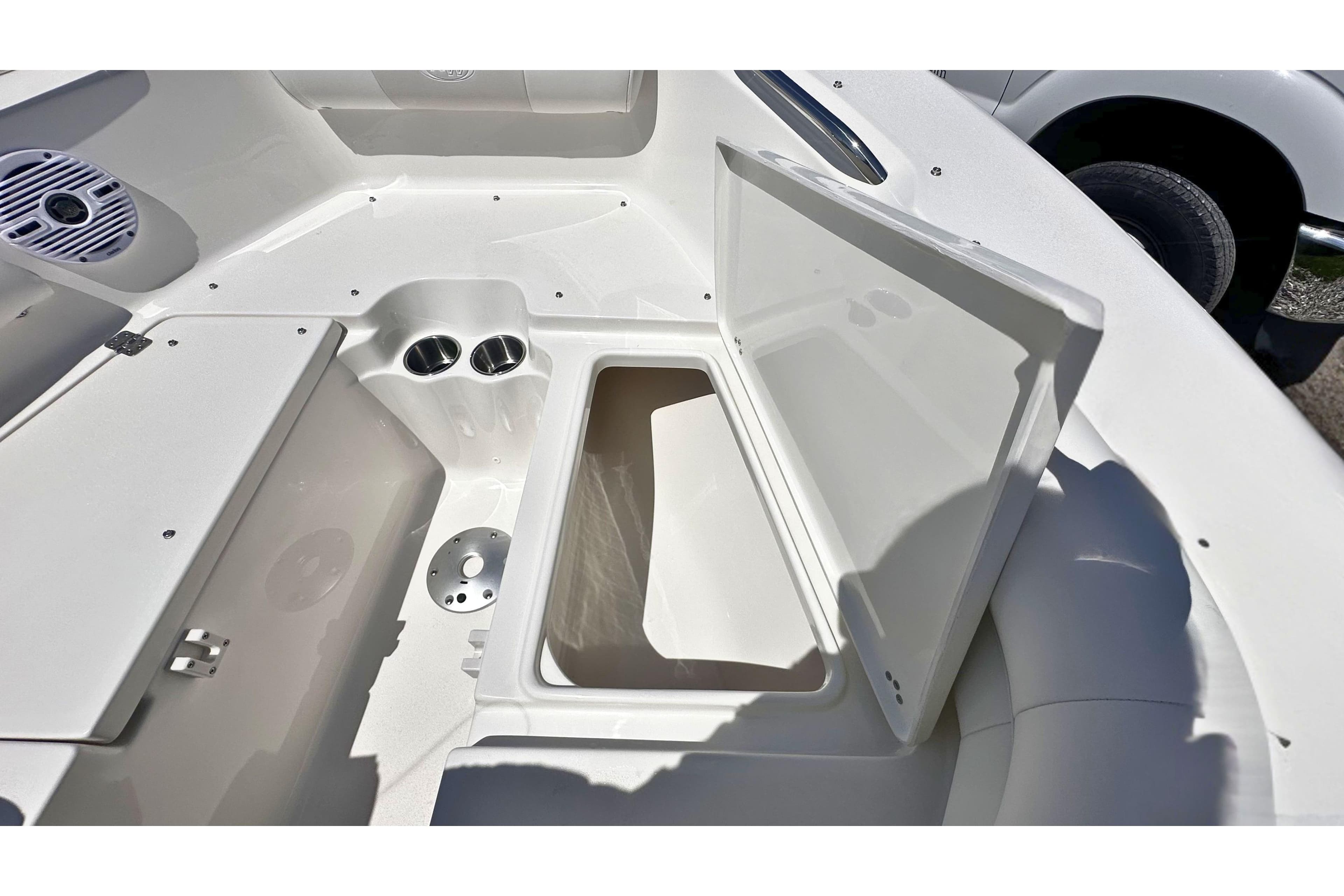Open storage compartment on 2026 Key West 203 DFS boat interior.