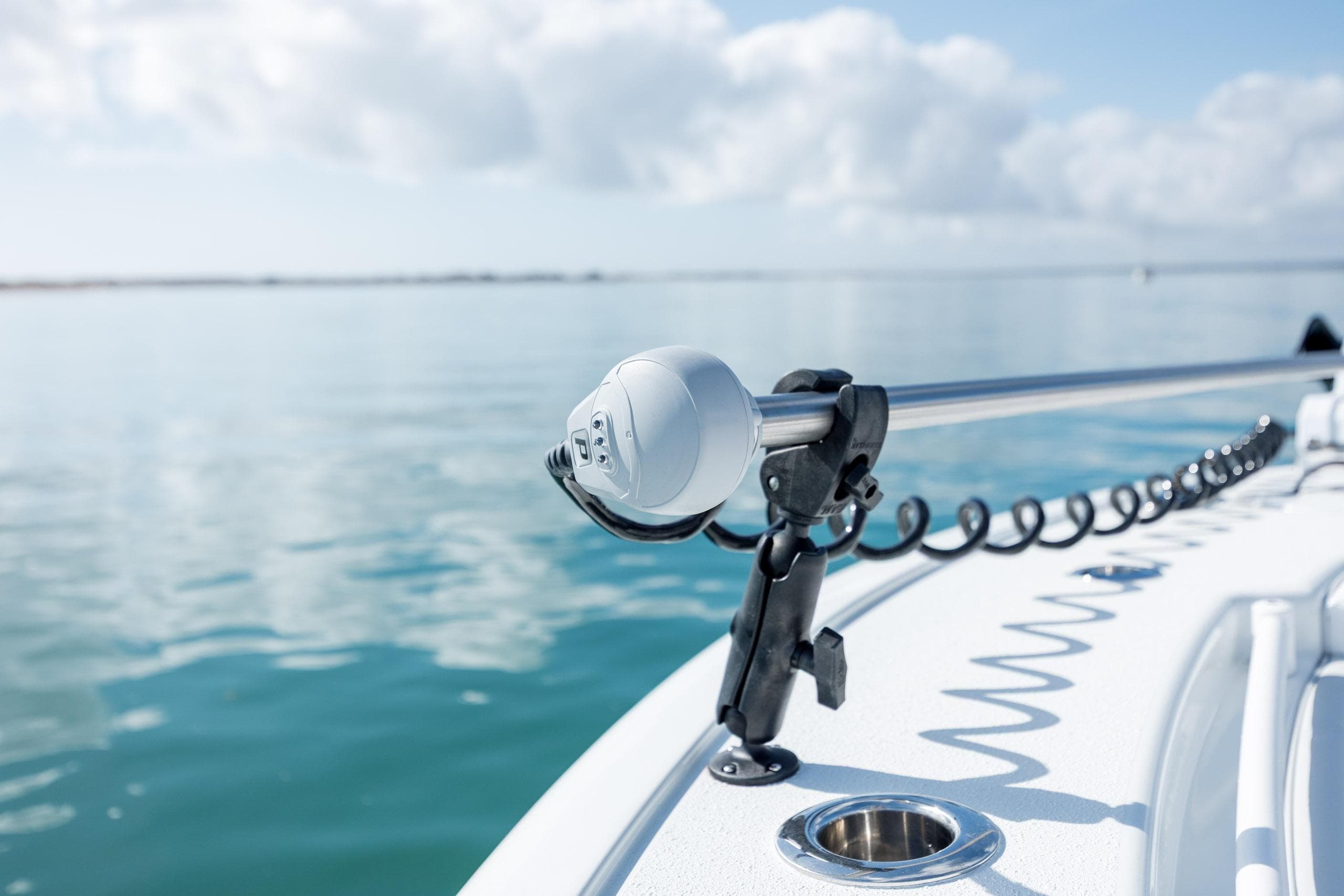 2026 Yellowfin 26 Hybrid boat detail with clear ocean view and blue sky.
