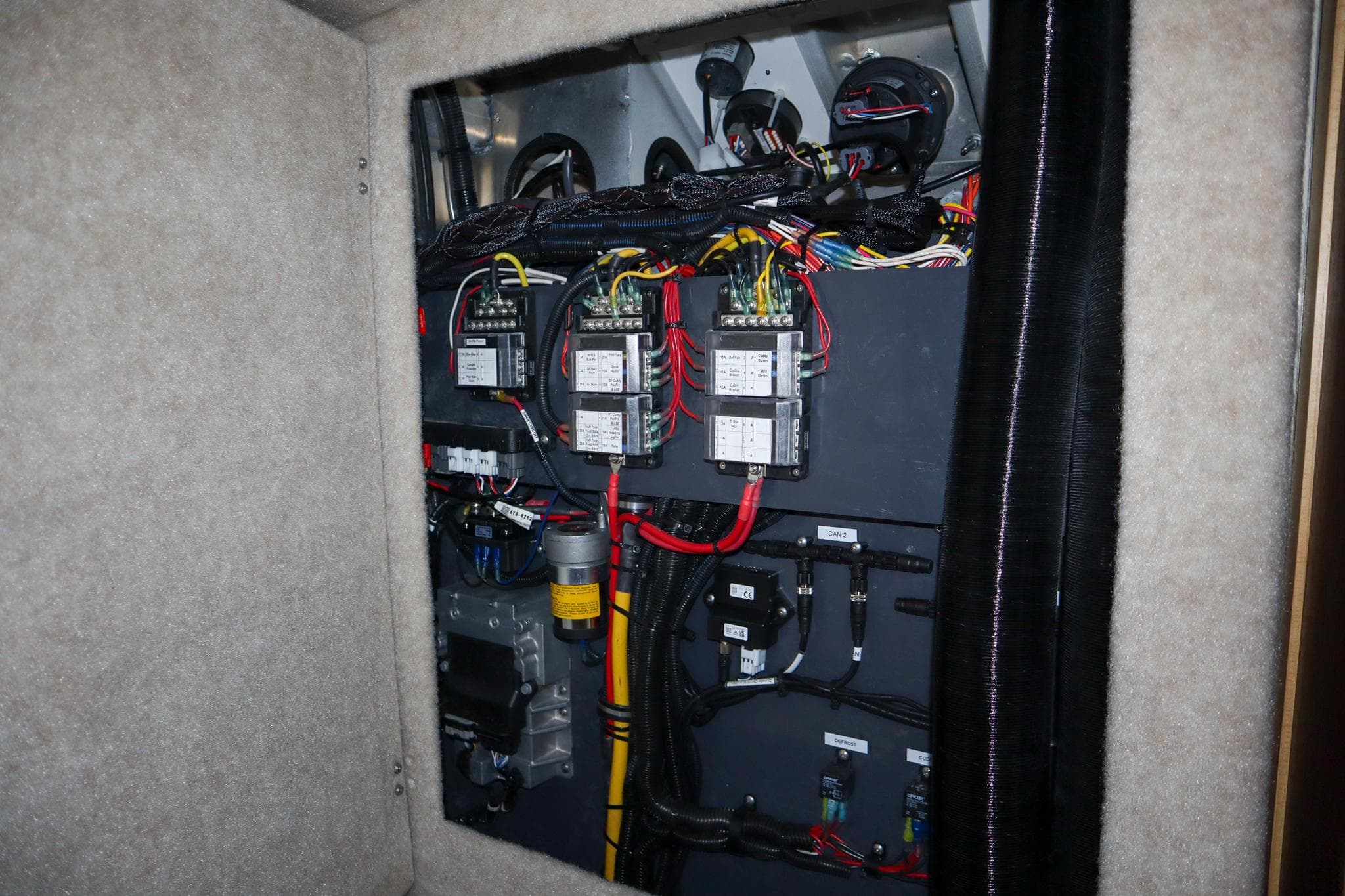 Electrical panel of 2025 Hewescraft 290 Adventure ET HT boat, showcasing wiring and components.
