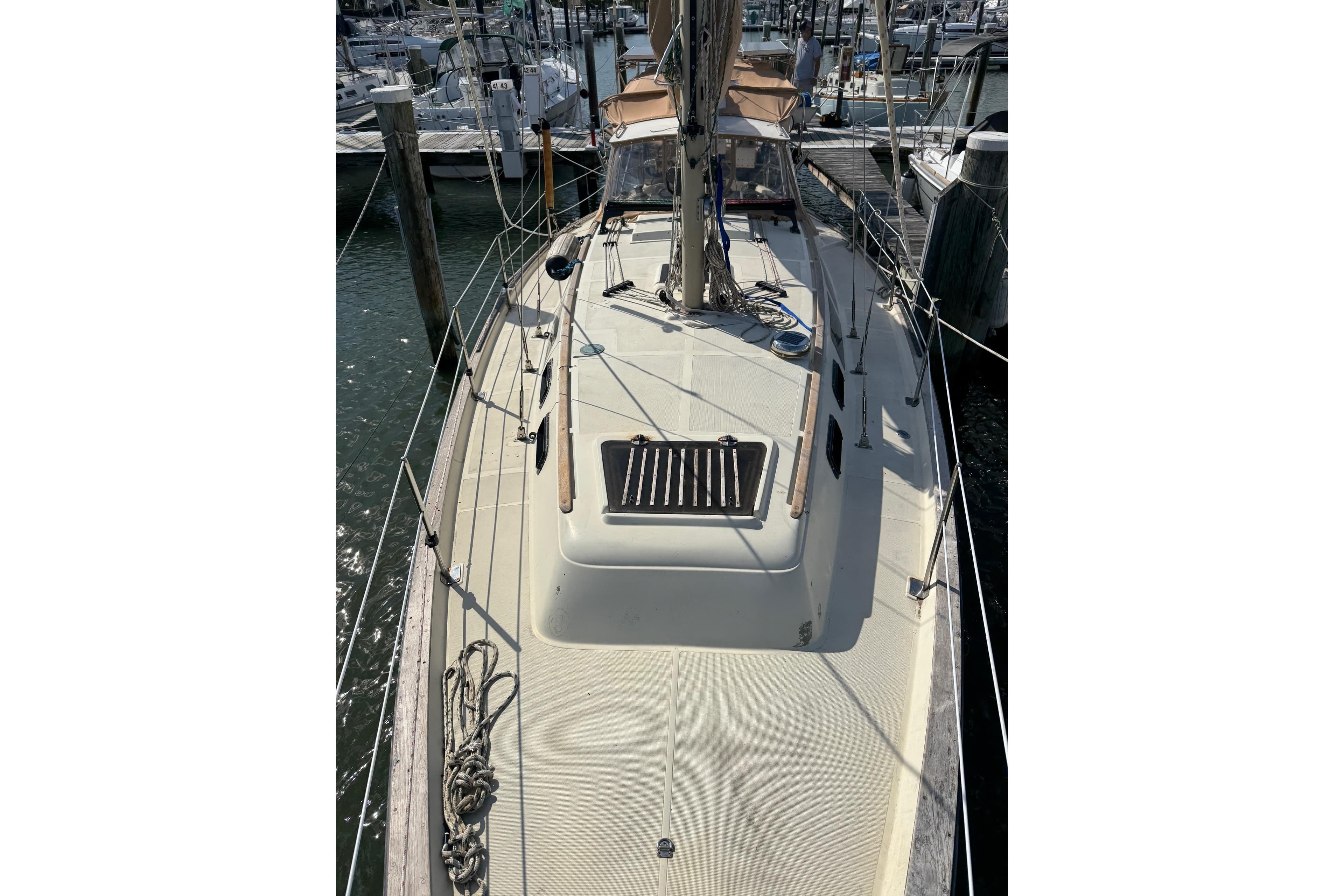 1981 S2 36 sailboat docked at marina, showcasing deck and rigging.