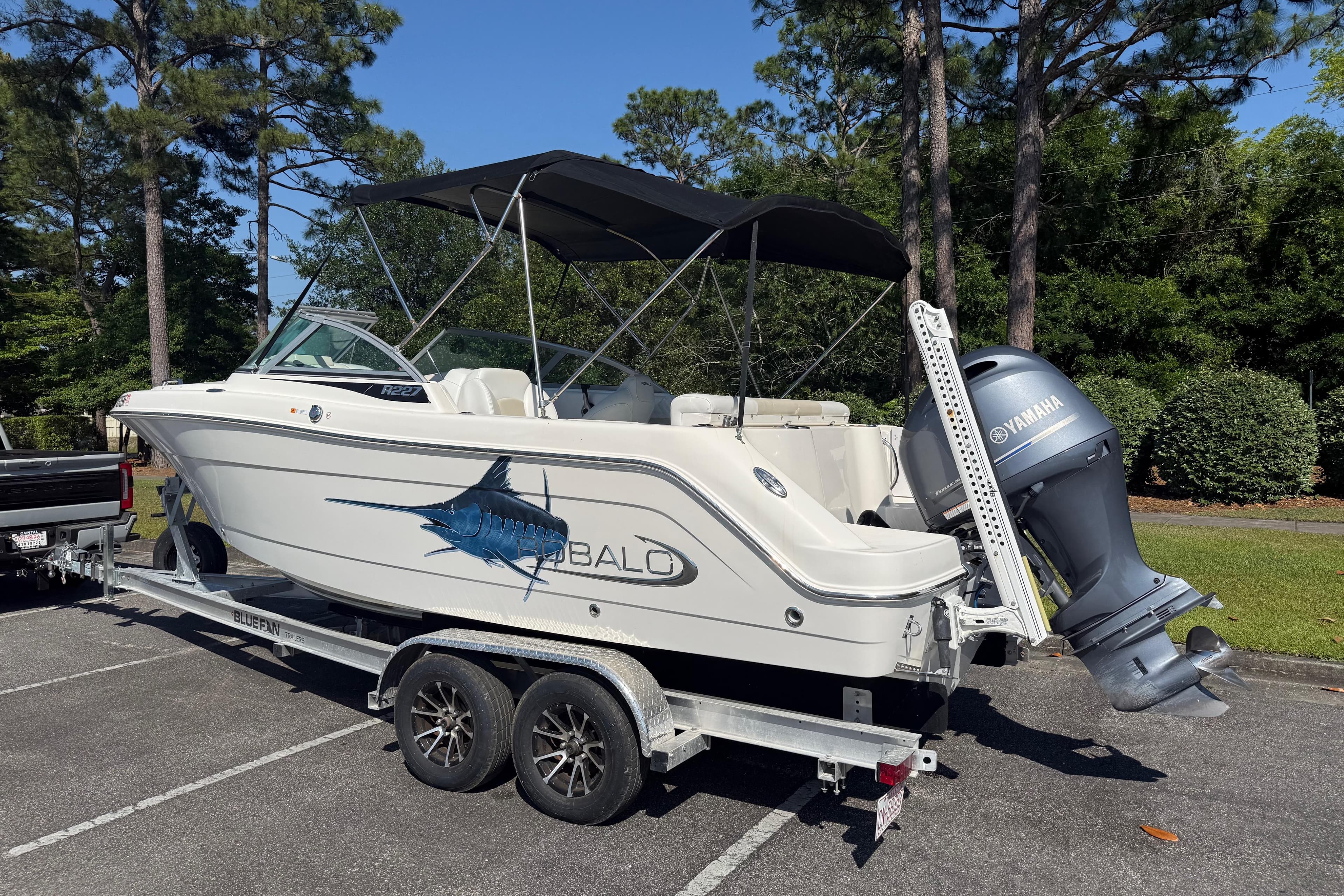 2015 Robalo R227 Dual Console boat on trailer with Yamaha outboard motor.