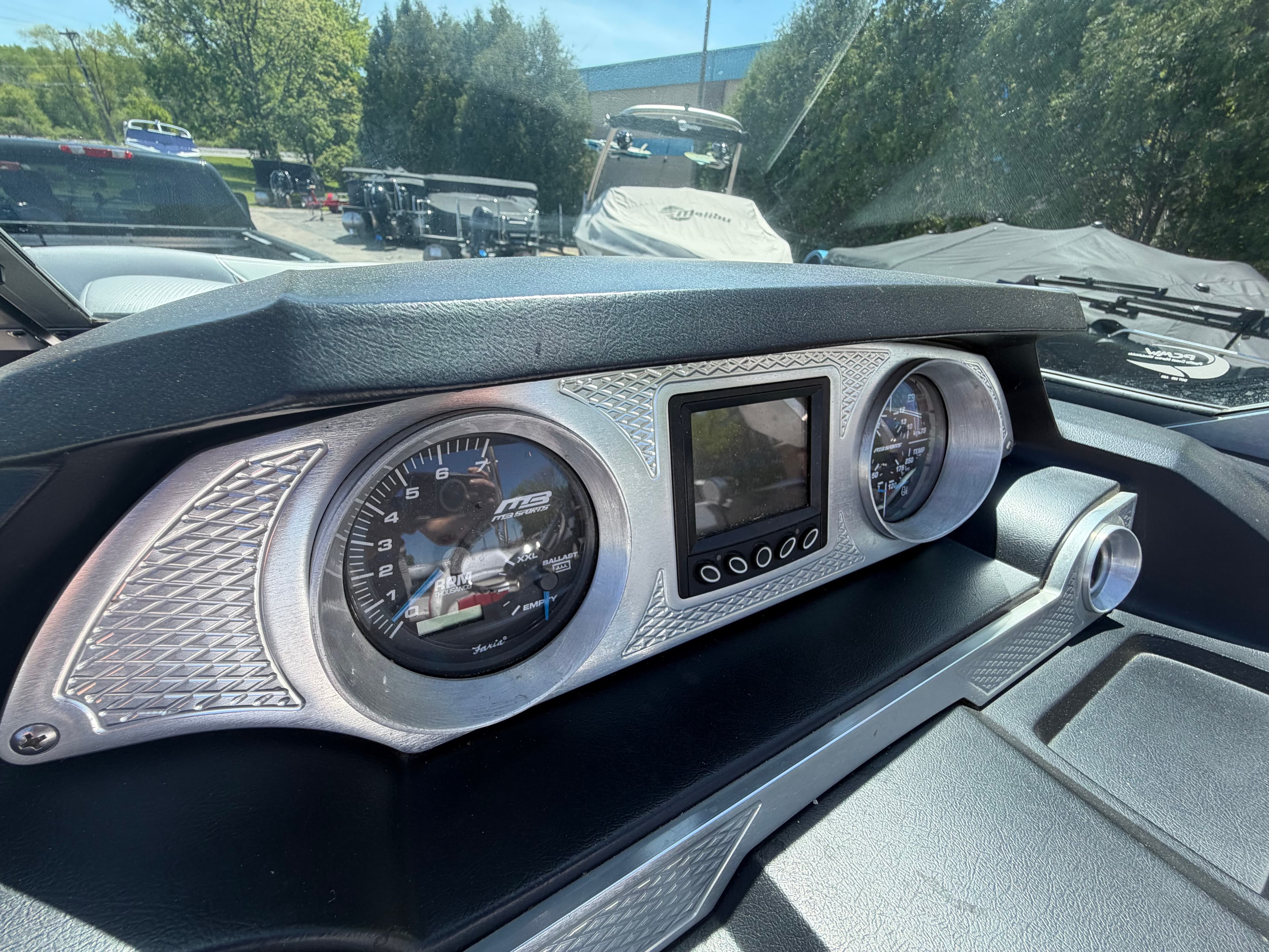 Dashboard of a 2015 MB SPORTS B52 23 boat.