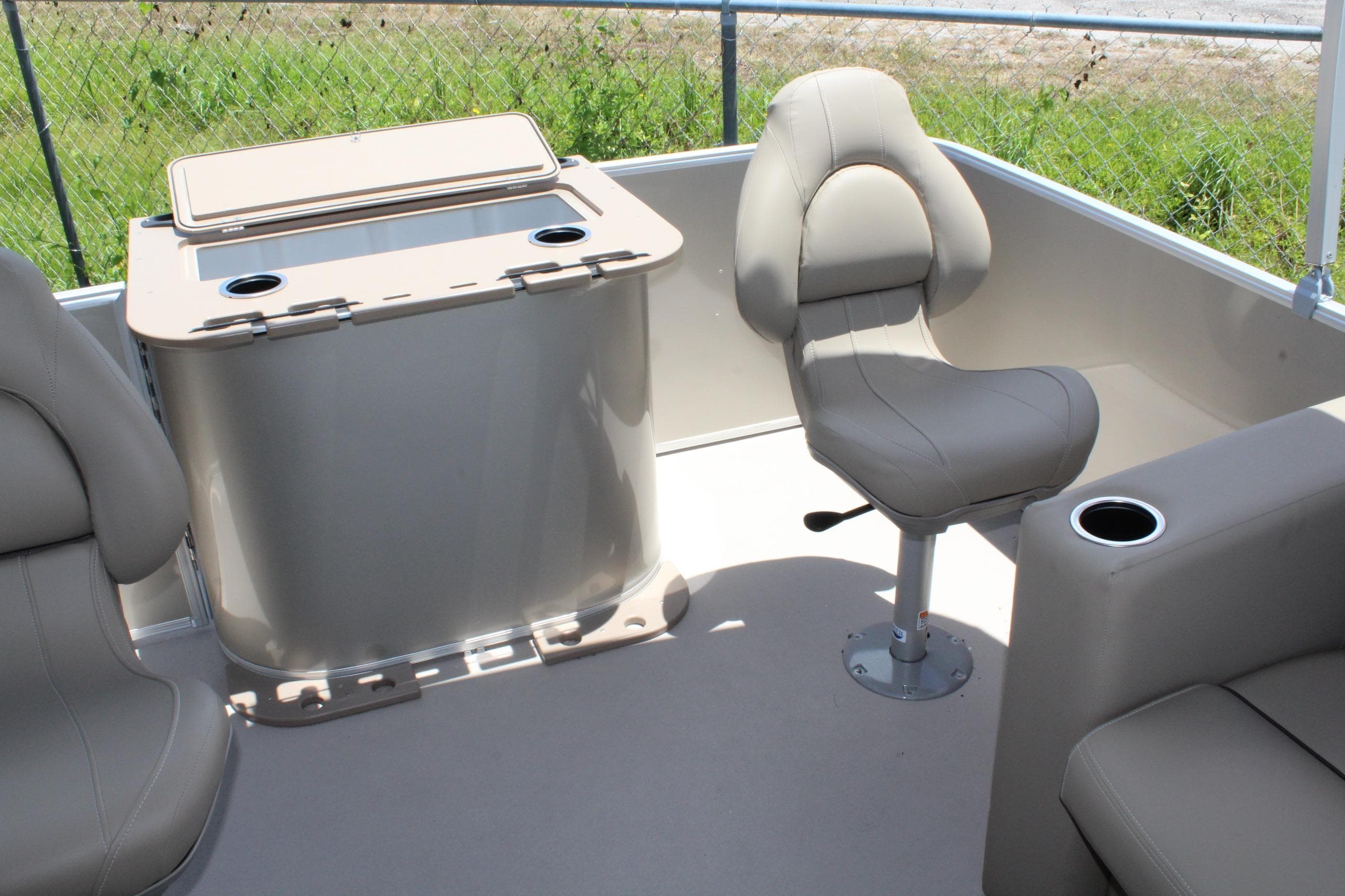 2026 Sylvan Mirage 820 PARTY FISH boat interior with seating and storage.